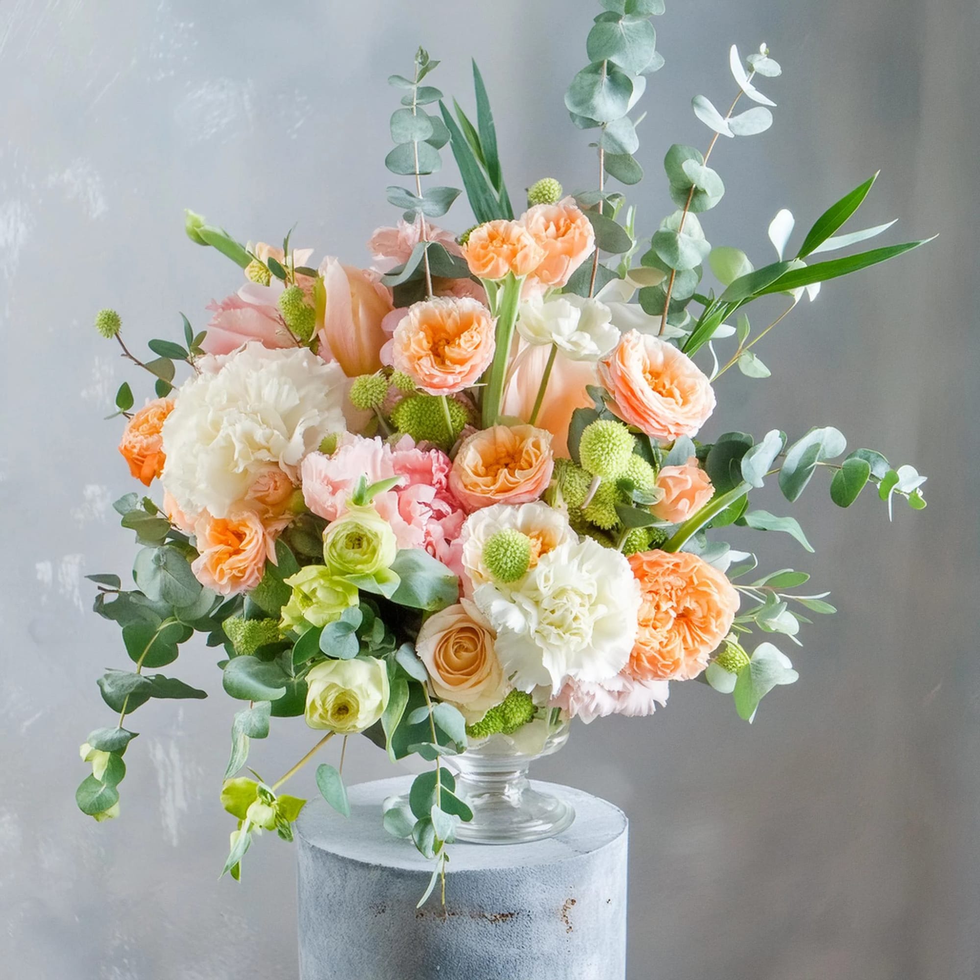 The Elegant Event Centerpiece is a stunning and sophisticated arrangement, perfect for