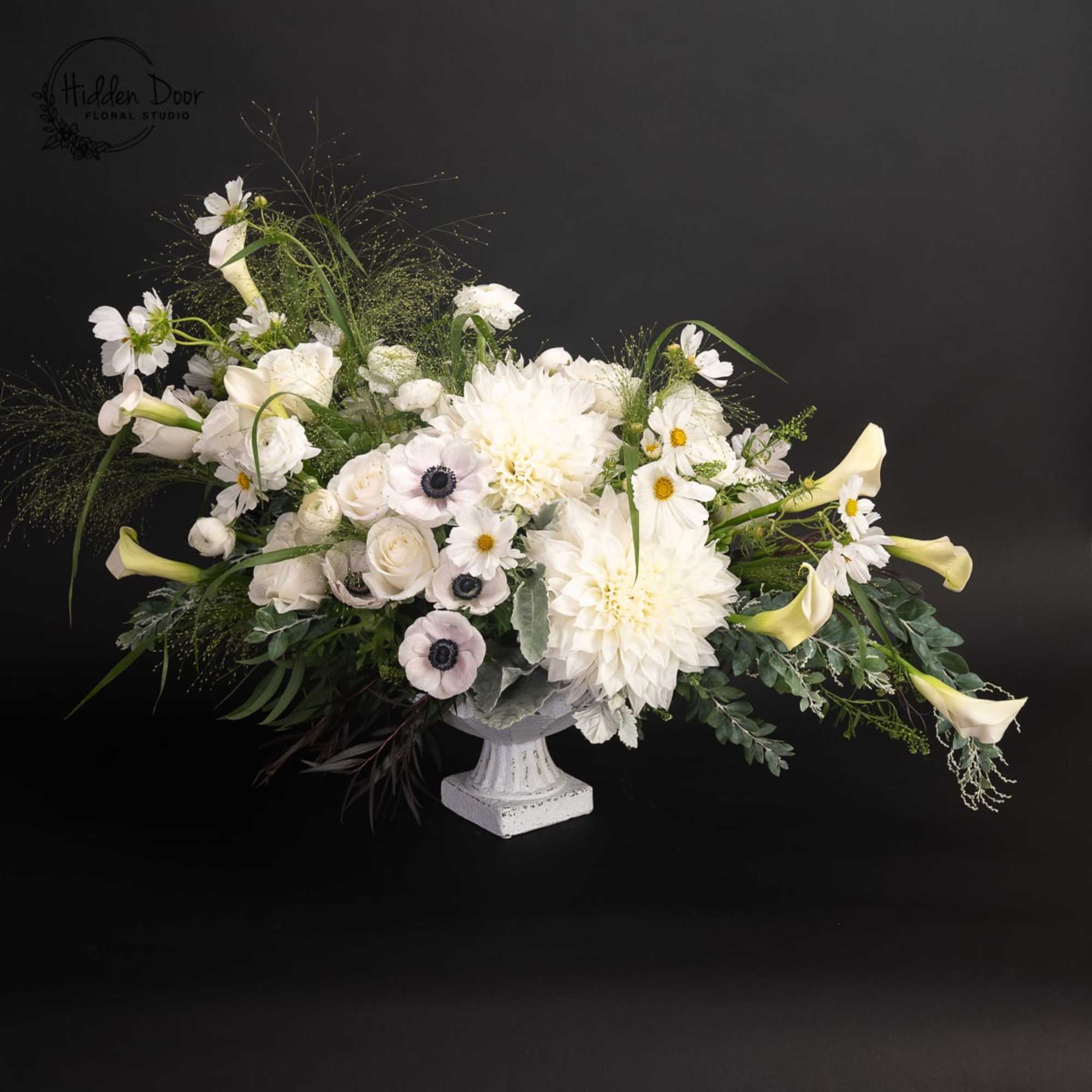Beautiful, large, elegant, white, and a modern floral creation,  made with