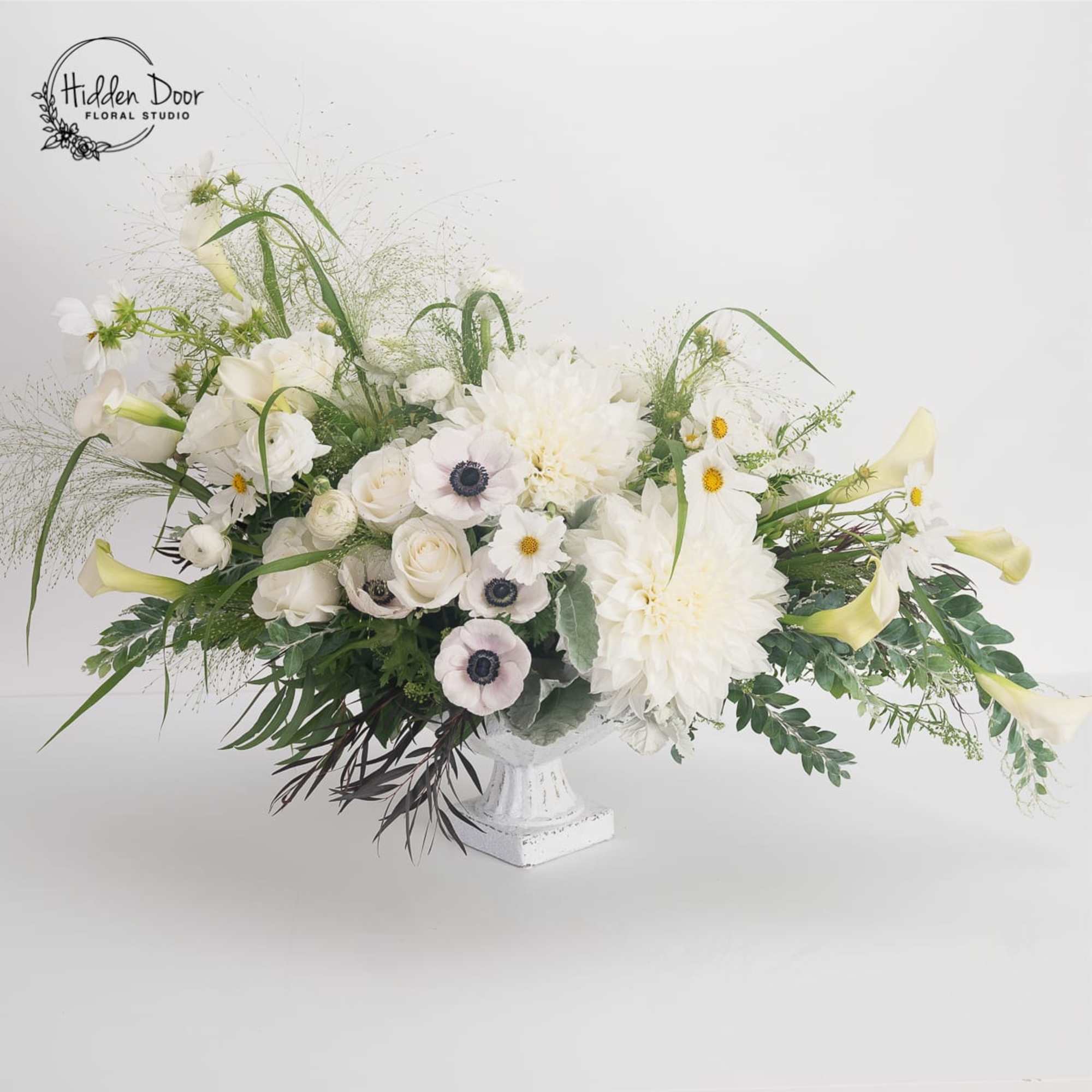 Beautiful, large, elegant, white, and a modern floral creation,  made with