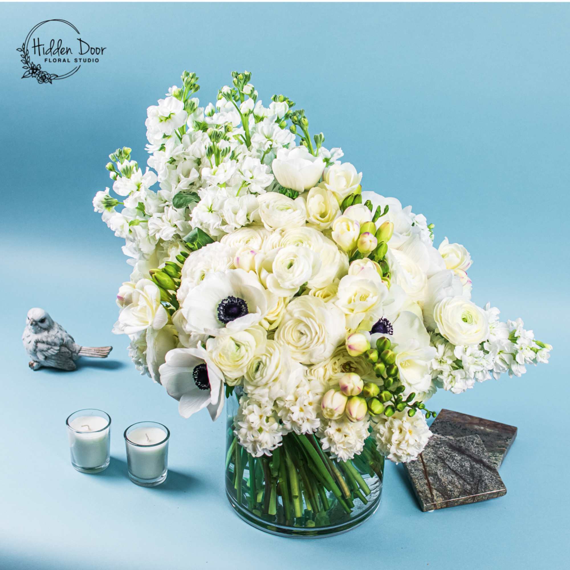  This captivating bouquet is a true masterpiece that exudes class, sophistication
