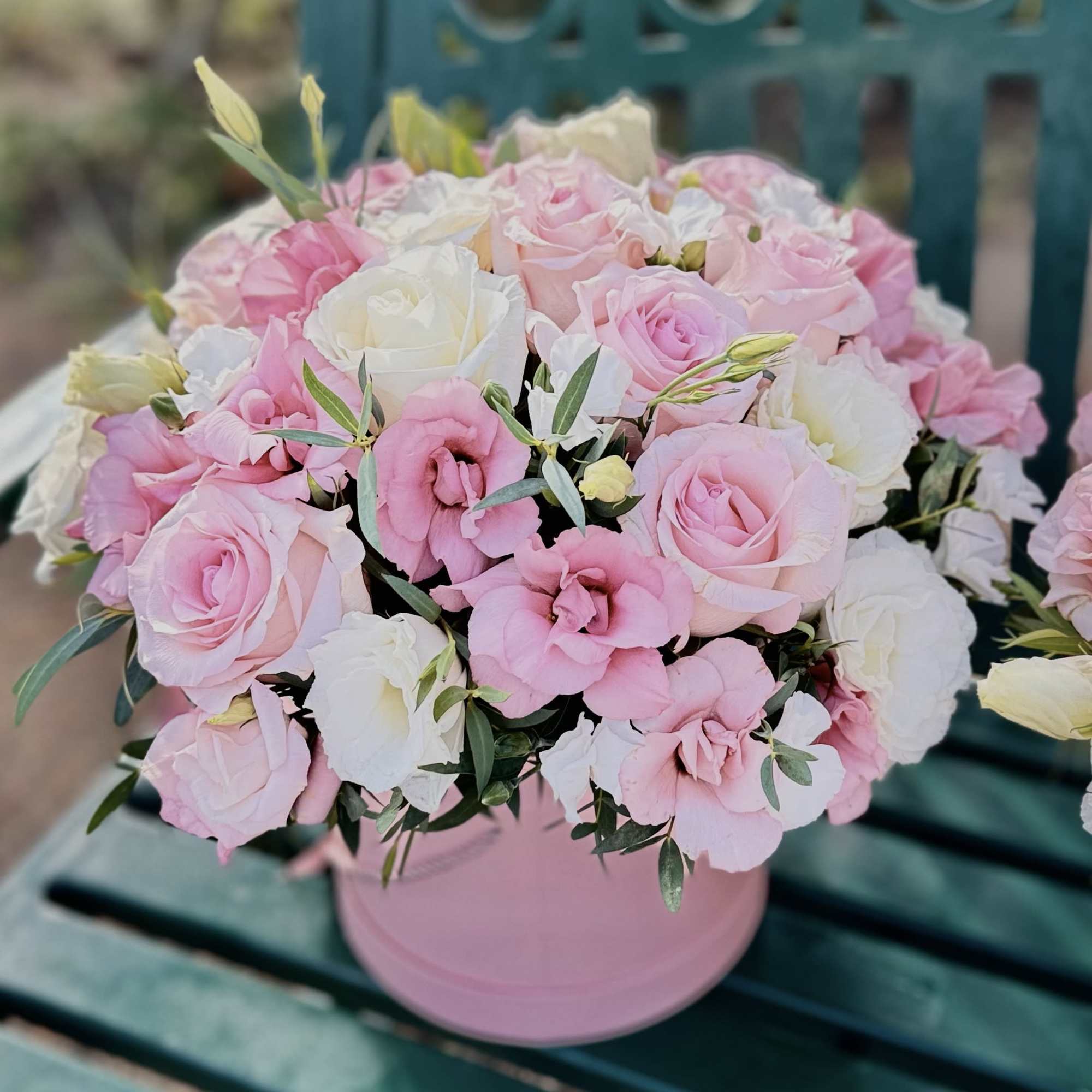 The Gentle Embrace bouquet beautifully combines the delicate petals of eustoma  The Gentle Embrace bouquet beautifully combines the delicate petals of eustoma