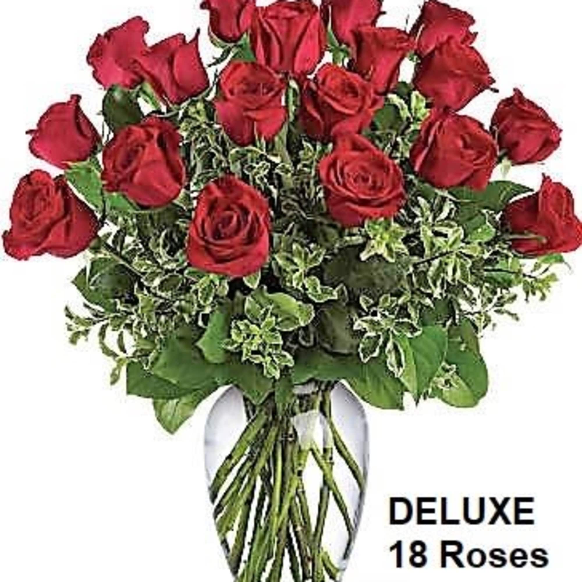 - AS SHOWN: 12 red roses arranged in a vase
- DELUXE: 18