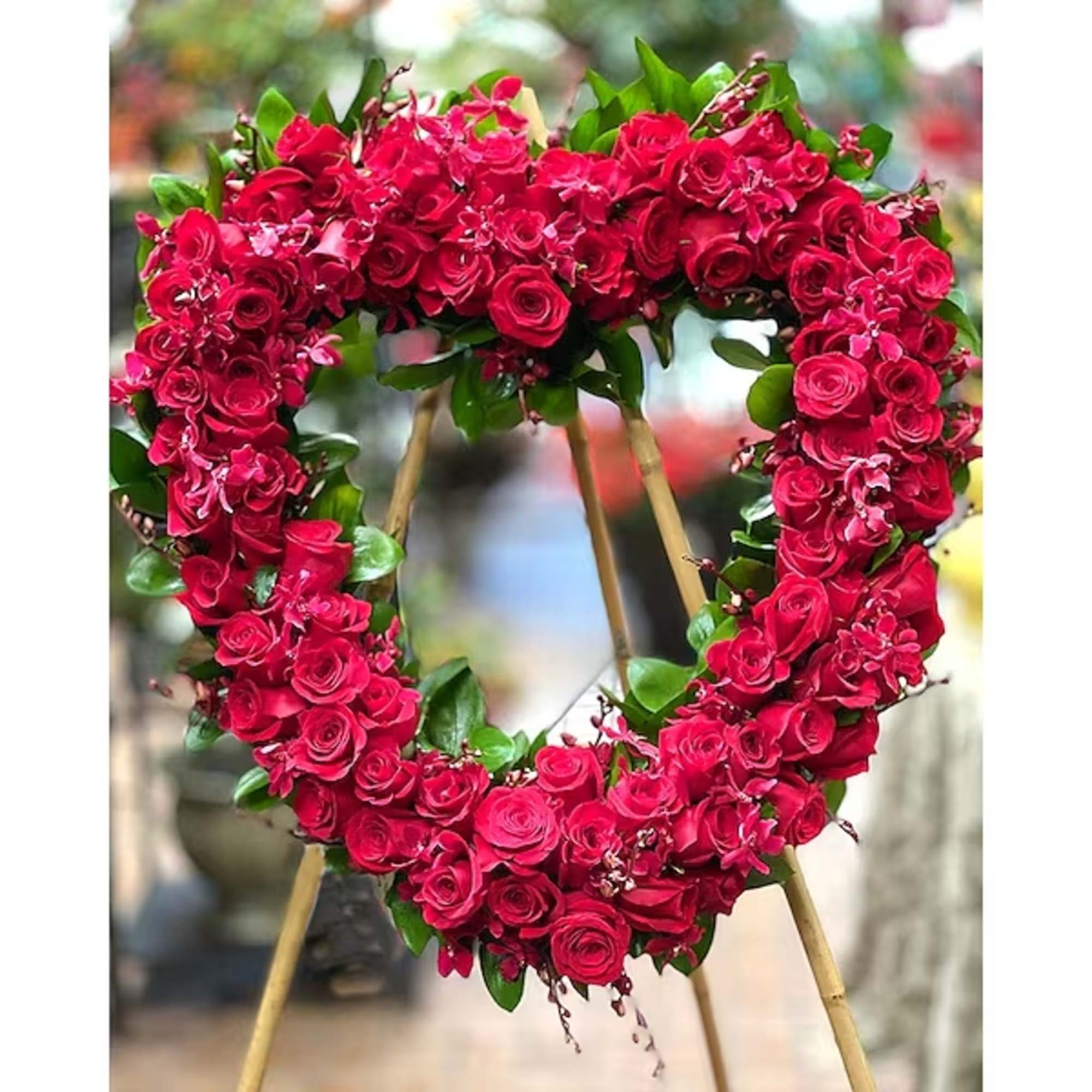 Roses are paved into a 24", 30", and 36"  heart form