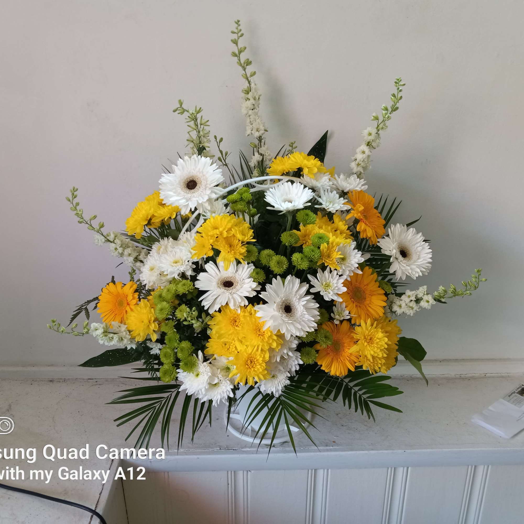 Beautiful worm combination of white and yellow gerbera daisies and yellow and