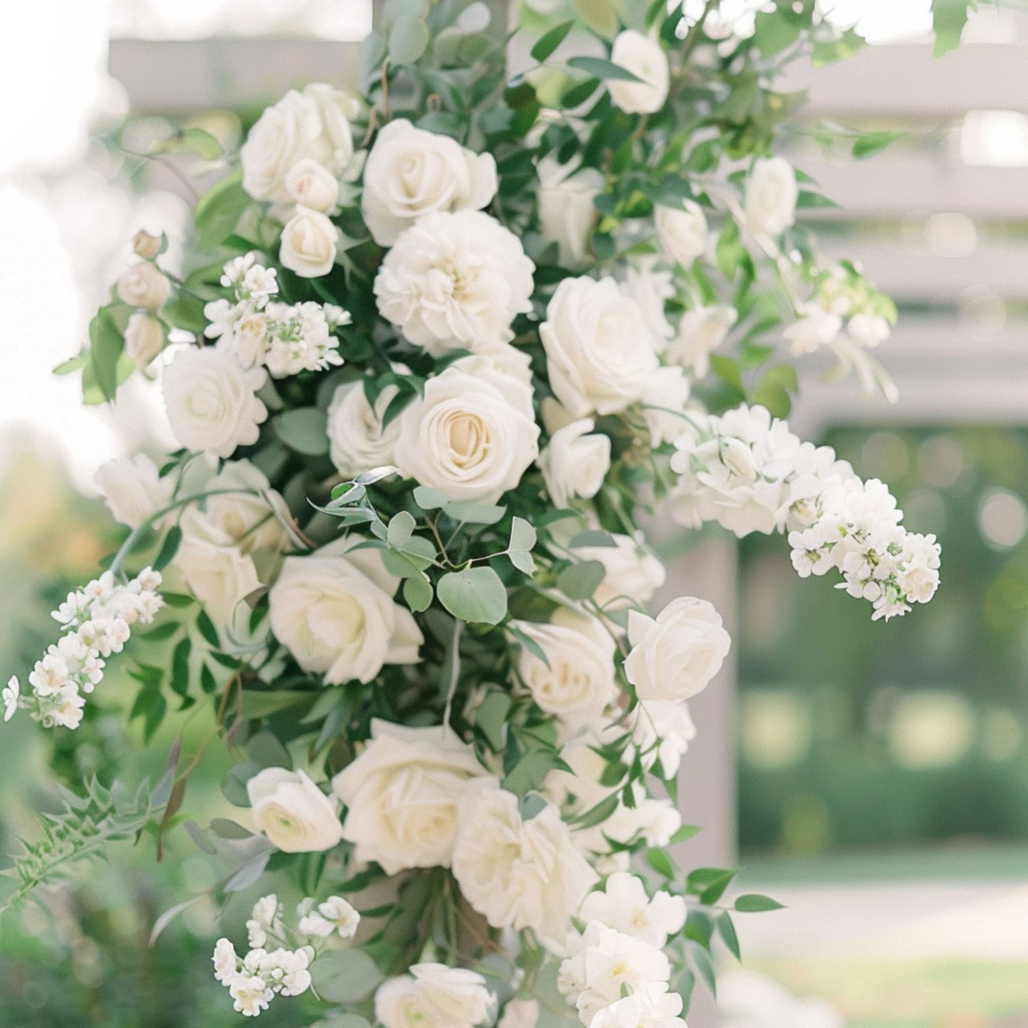 Add a touch of floral artistry to your ceremony space or photo