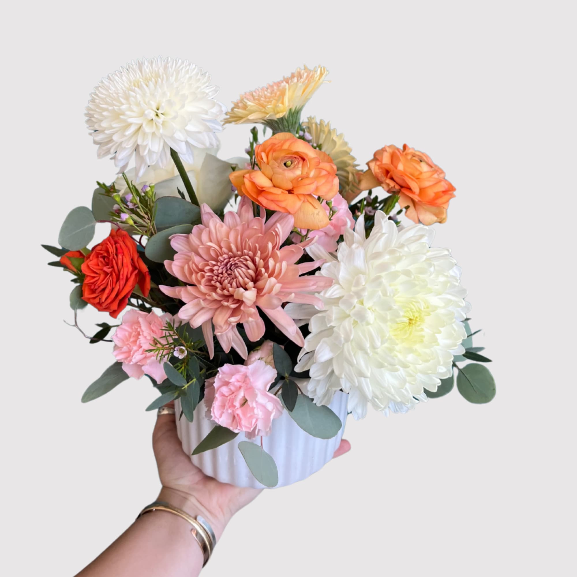 A joyful burst of spring in flower form &mdash; this arrangement is