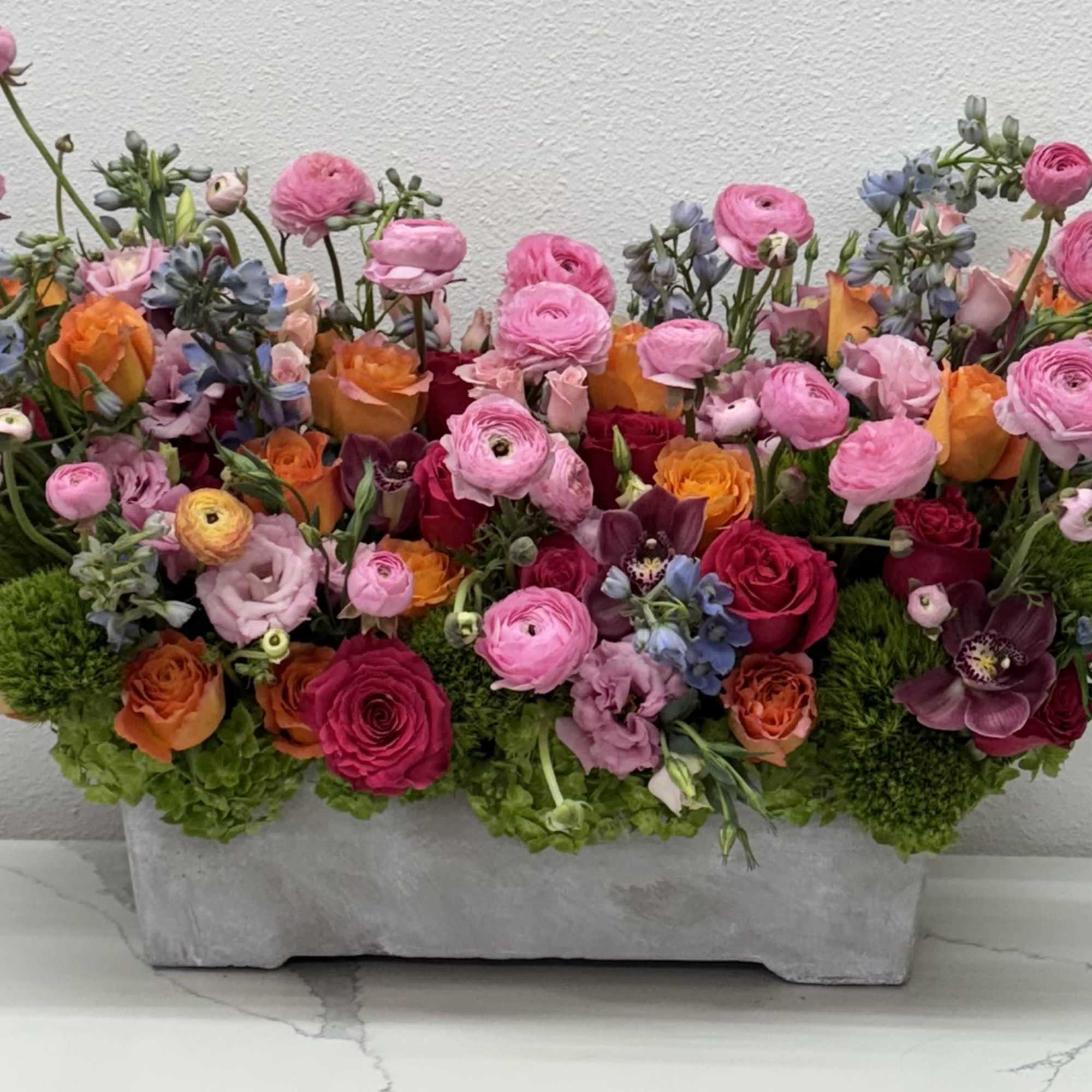 

Embrace the essence of spring with our vibrant &quot;Spring Symphony Arrangement&quot;! This