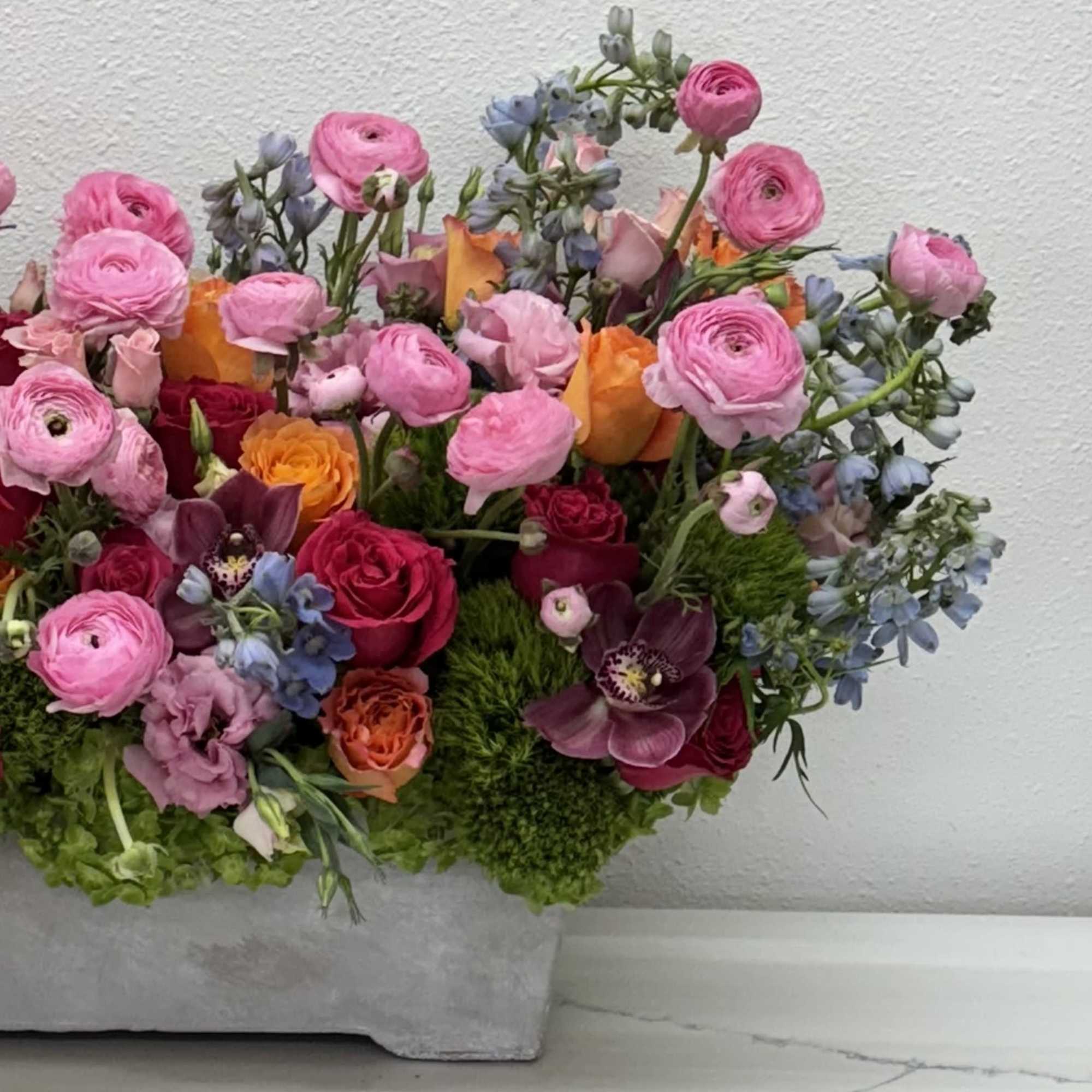 

Embrace the essence of spring with our vibrant &quot;Spring Symphony Arrangement&quot;! This