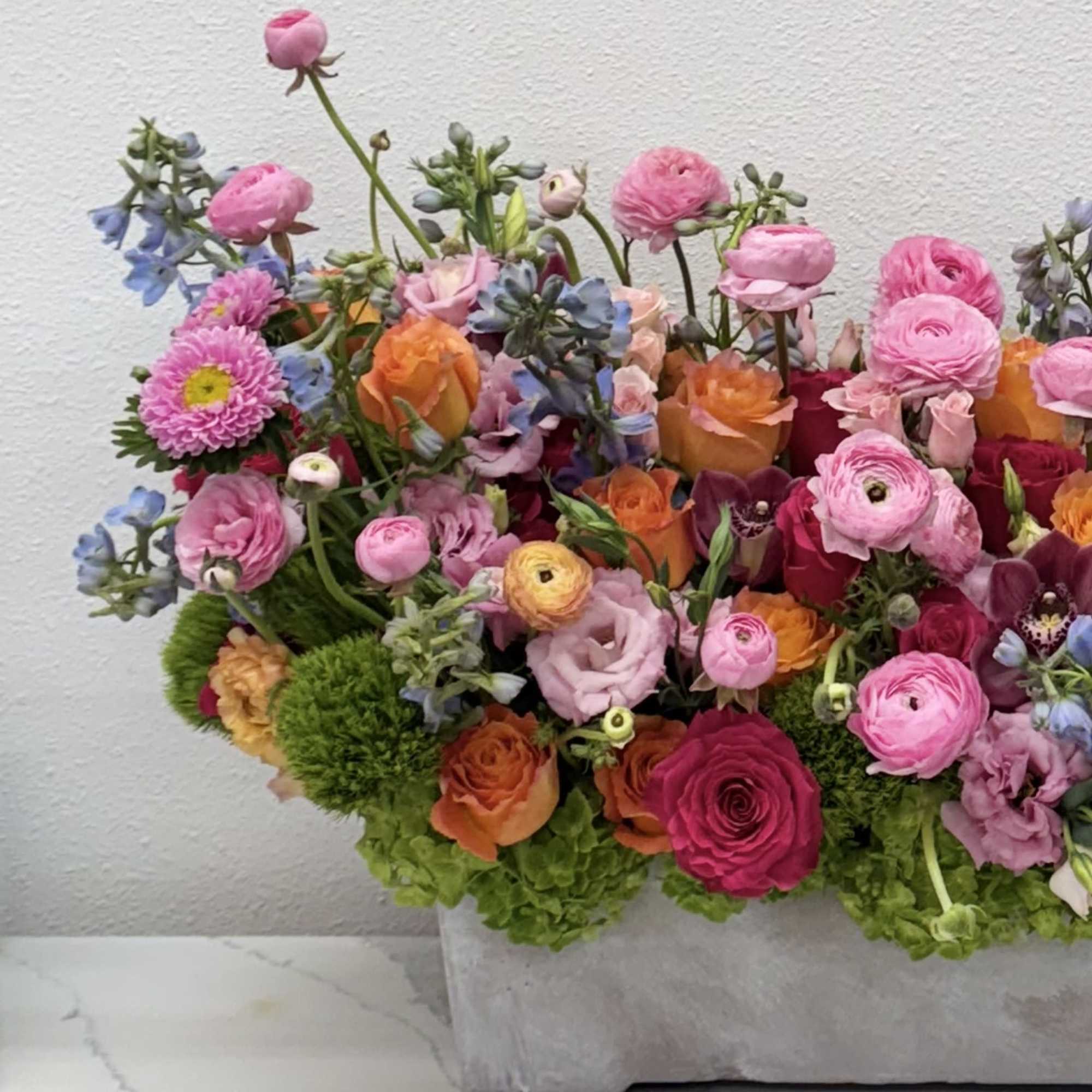 

Embrace the essence of spring with our vibrant &quot;Spring Symphony Arrangement&quot;! This