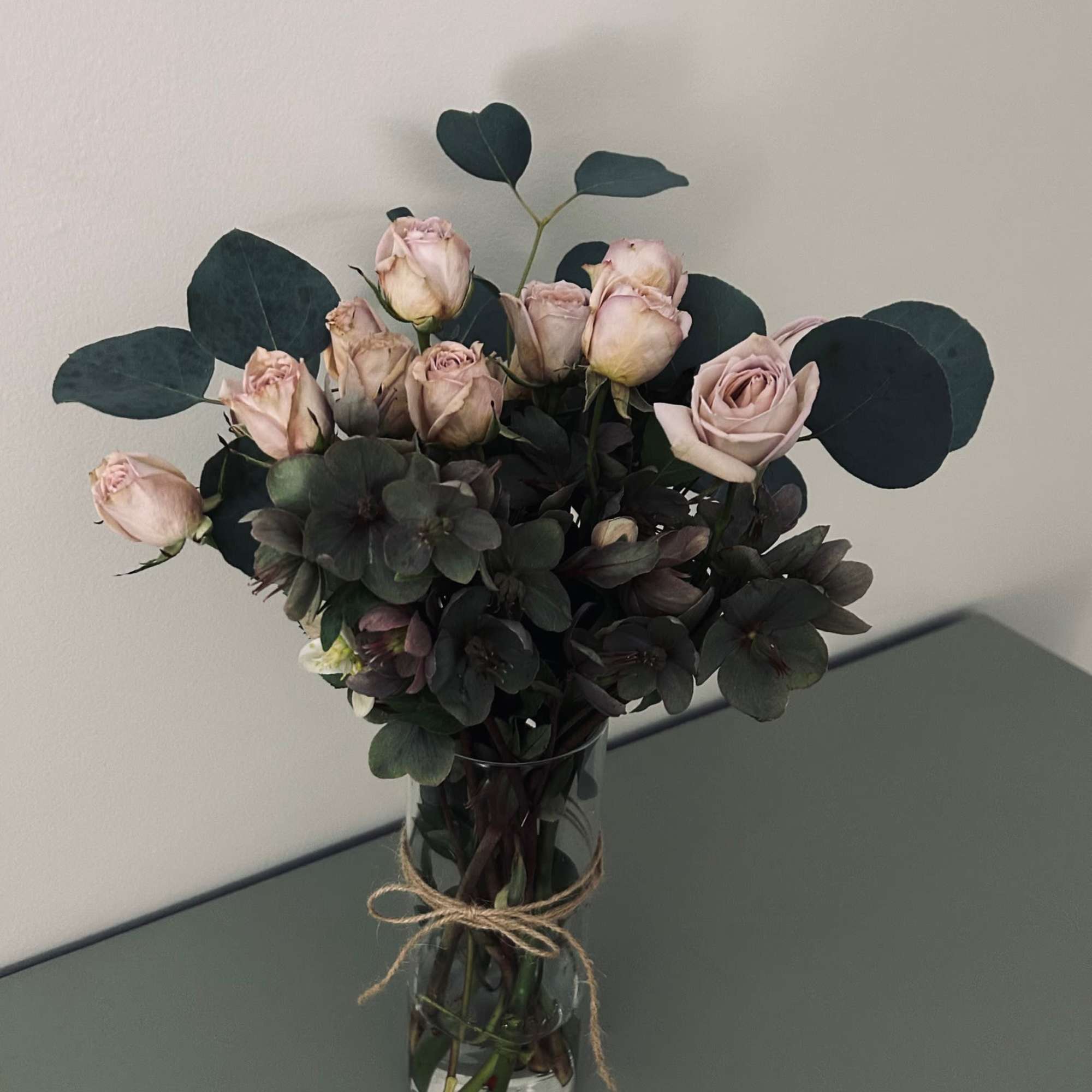 A gorgeous arrangement of fresh cut spray roses and fresh foliage, prepared A gorgeous arrangement of fresh cut spray roses and fresh foliage, prepared
