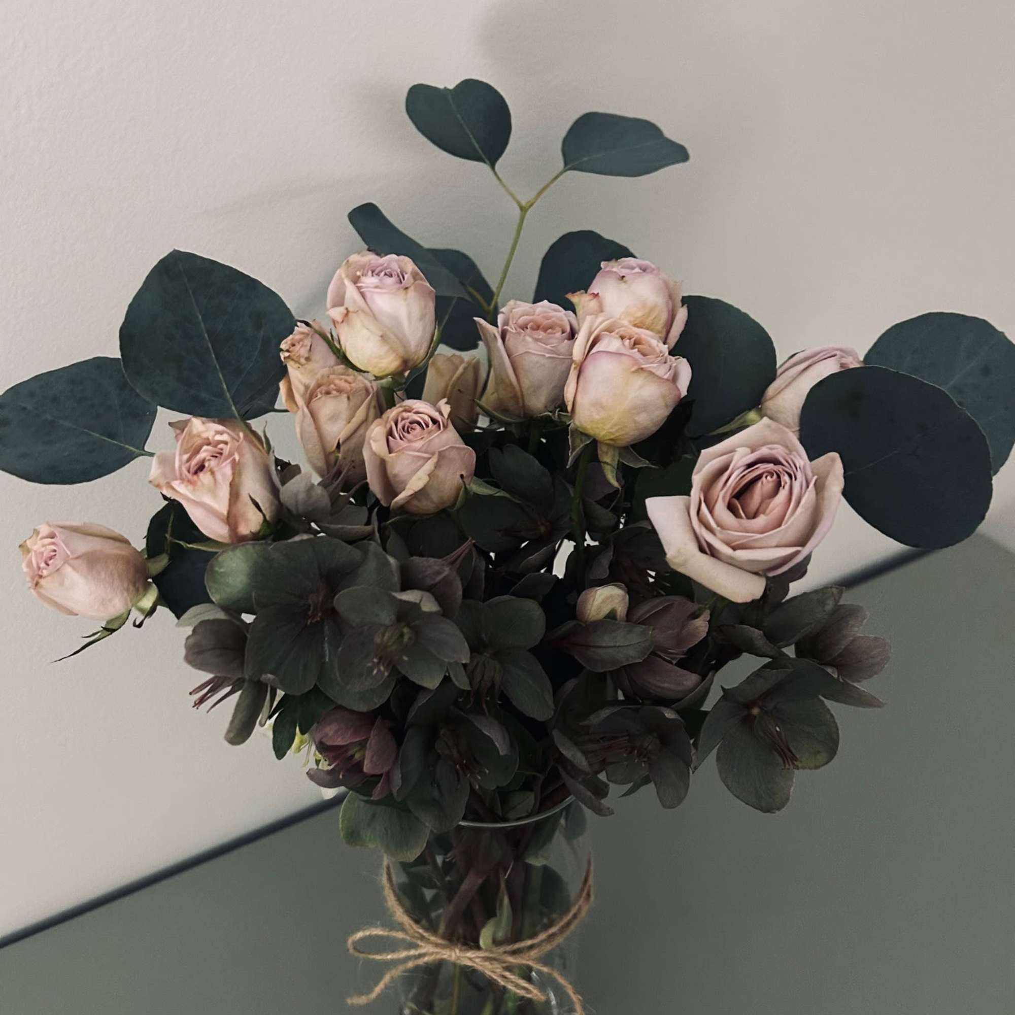 A gorgeous arrangement of fresh cut spray roses and fresh foliage, prepared A gorgeous arrangement of fresh cut spray roses and fresh foliage, prepared