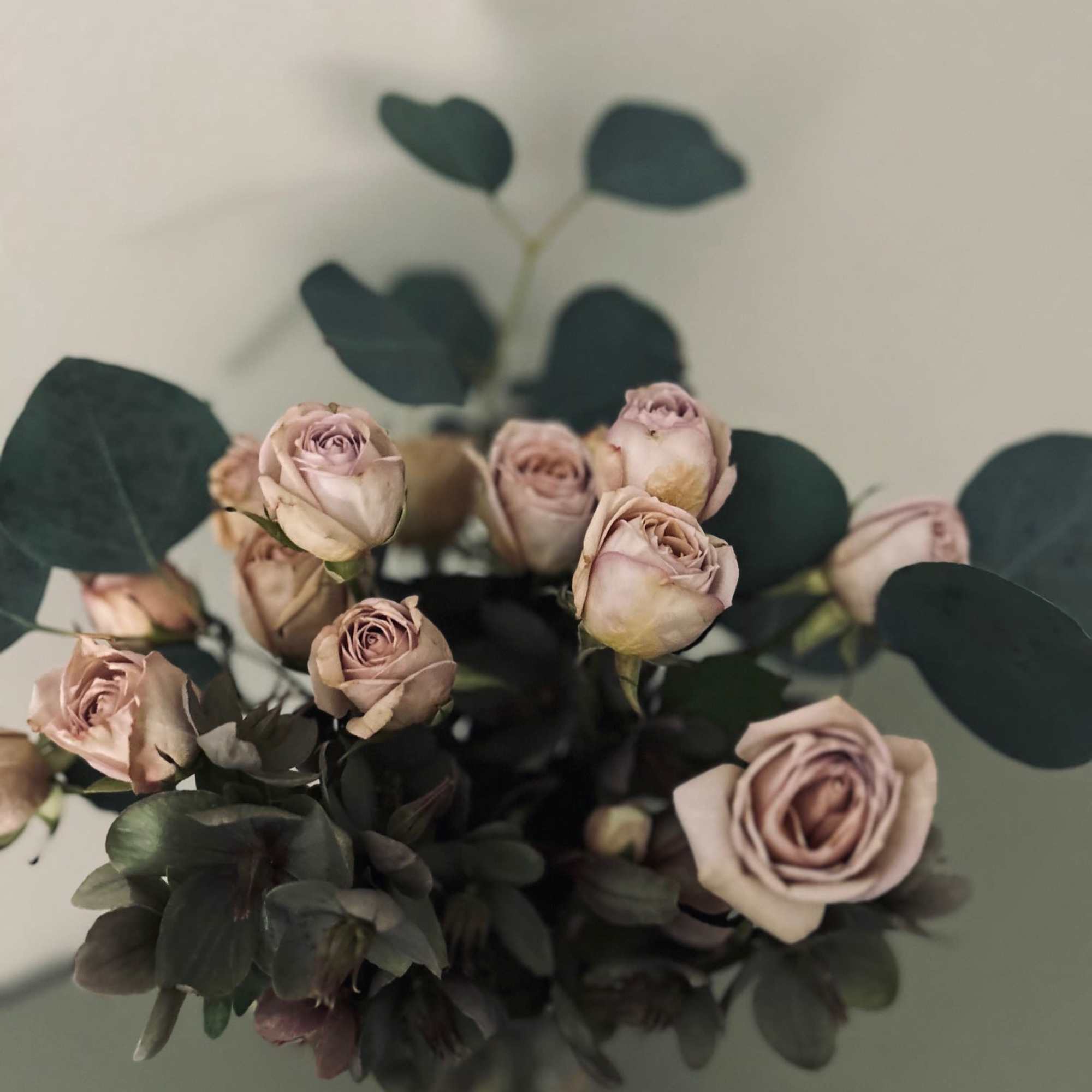 A gorgeous arrangement of fresh cut spray roses and fresh foliage, prepared A gorgeous arrangement of fresh cut spray roses and fresh foliage, prepared