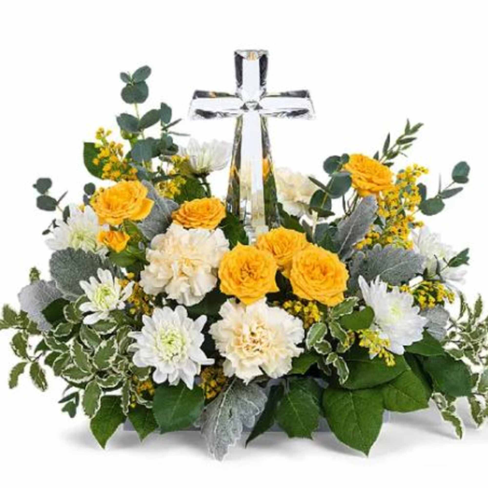 A crystal cross centerpiece is surrounded by the soft glow of yellow A crystal cross centerpiece is surrounded by the soft glow of yellow