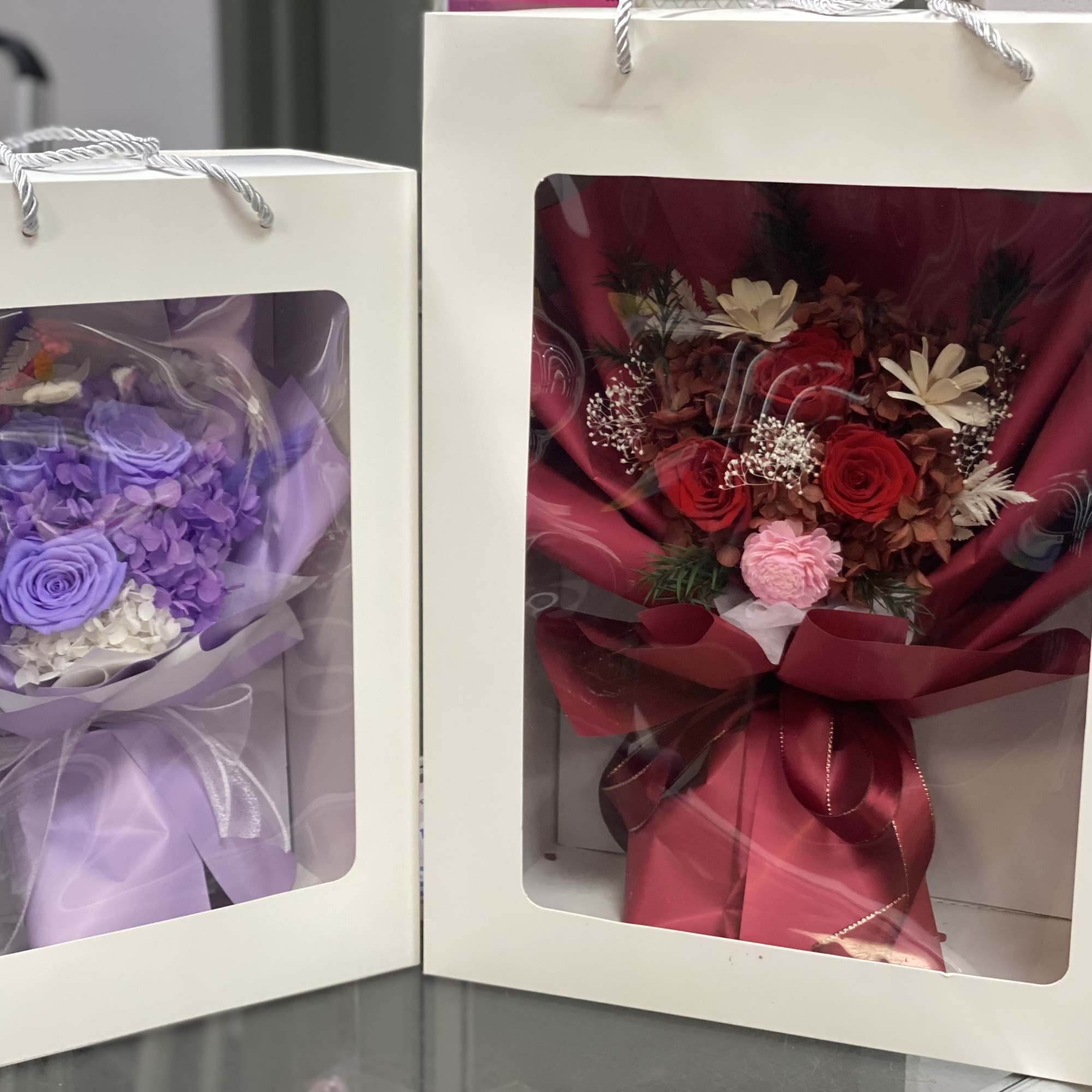 These are natural flowers preserved to make the long lasting. 
Available in