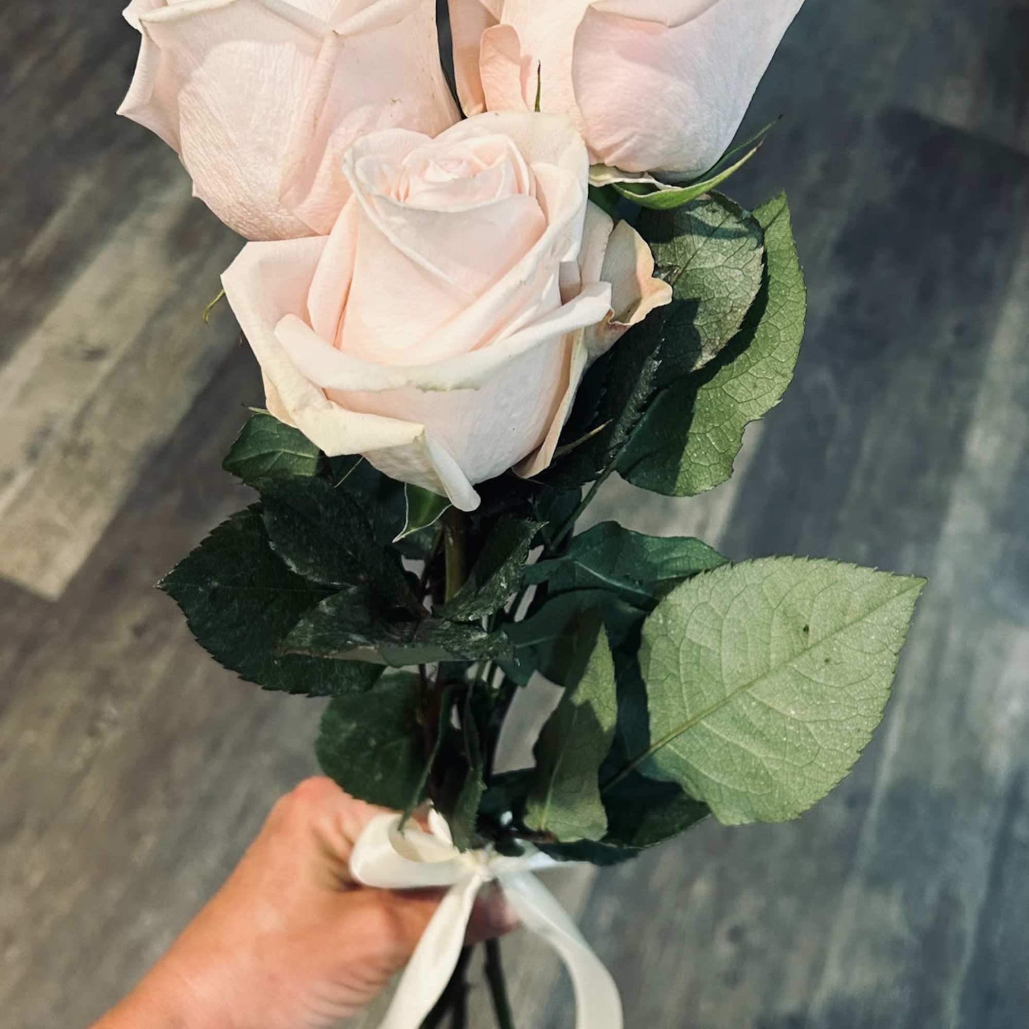 3 fresh cut roses of your color choice, delicately prepared and arranged 3 fresh cut roses of your color choice, delicately prepared and arranged