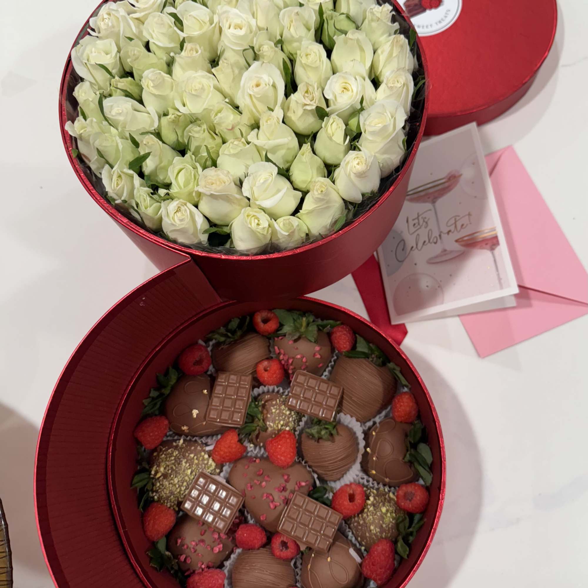 Delight in our exquisite two-layer creation:
	&bull;	Top Layer: Adorned with spray roses available