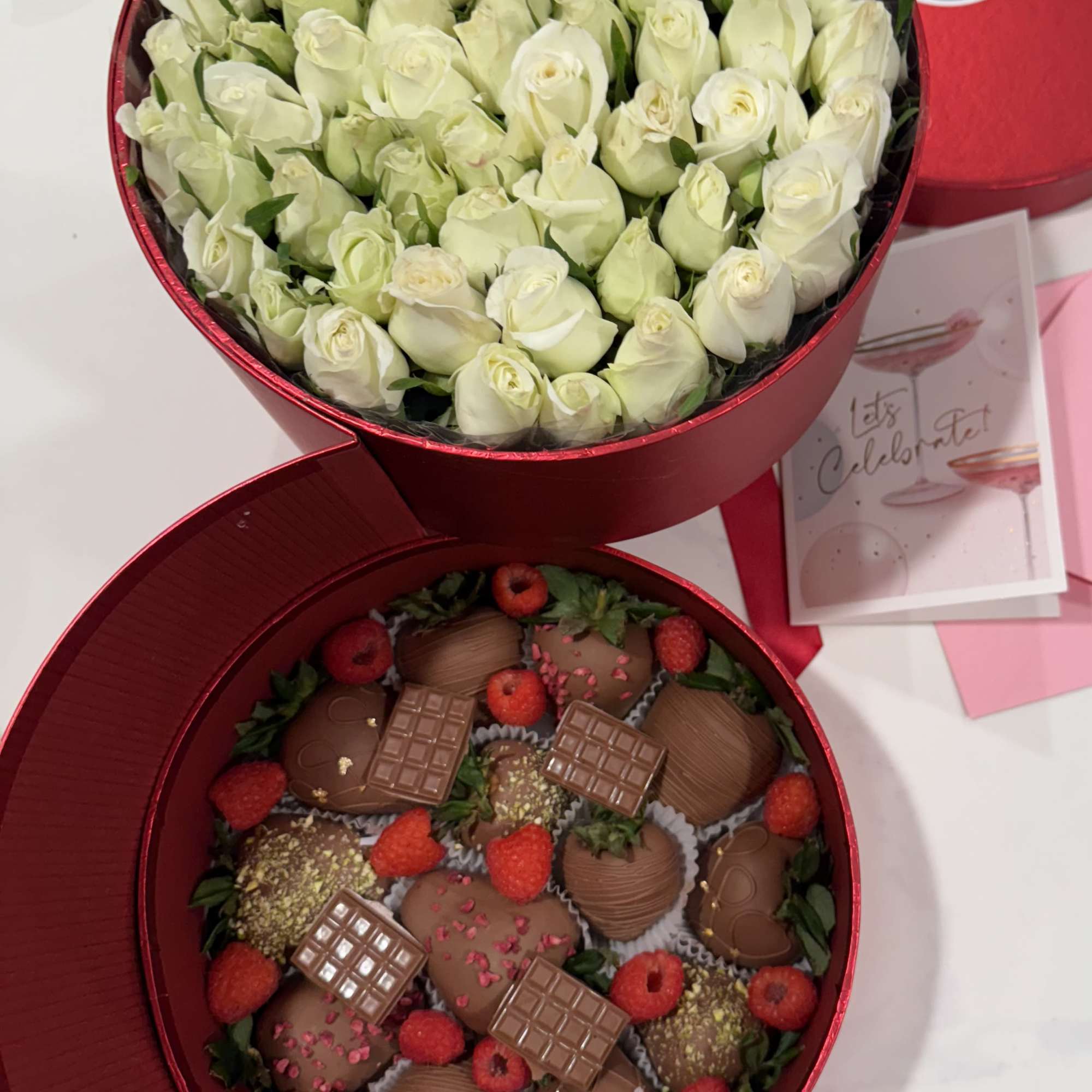 Delight in our exquisite two-layer creation:
	&bull;	Top Layer: Adorned with spray roses available