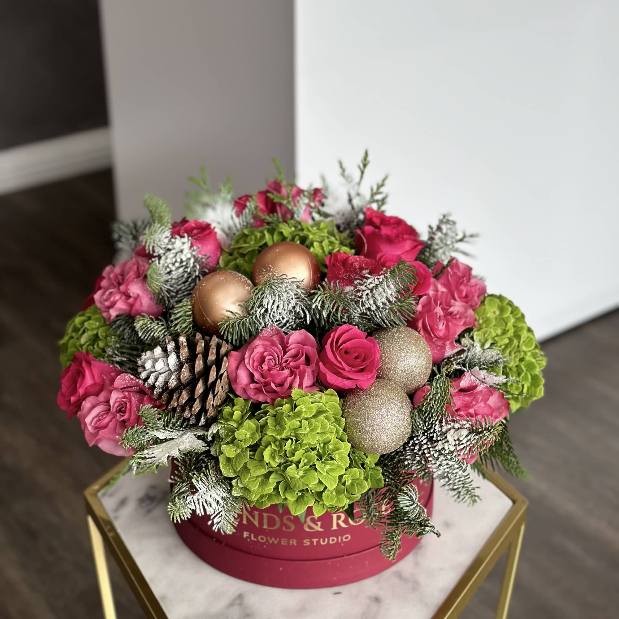 Our flat ivory box has a wonderful Christmas tree arrangement with fresh