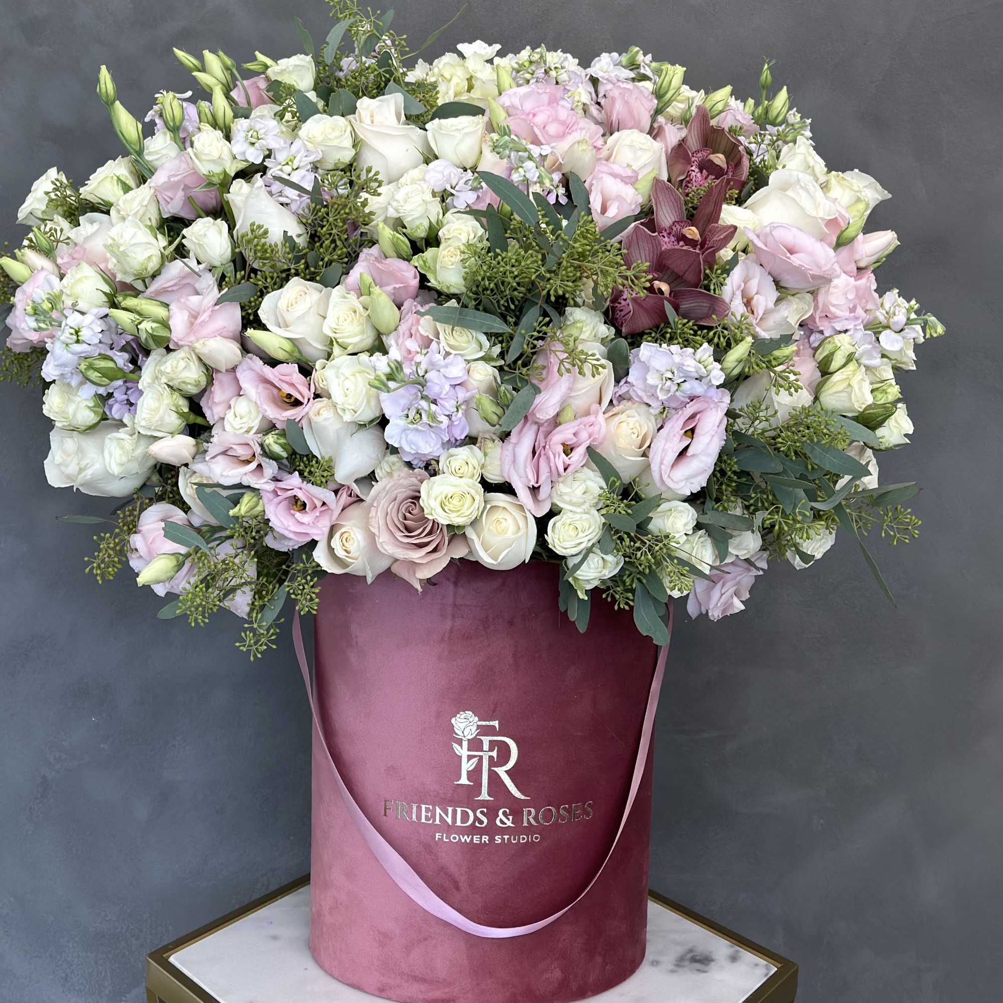 Outstanding floral mix in our dark pink signature box, stunning and one-of-a-kind