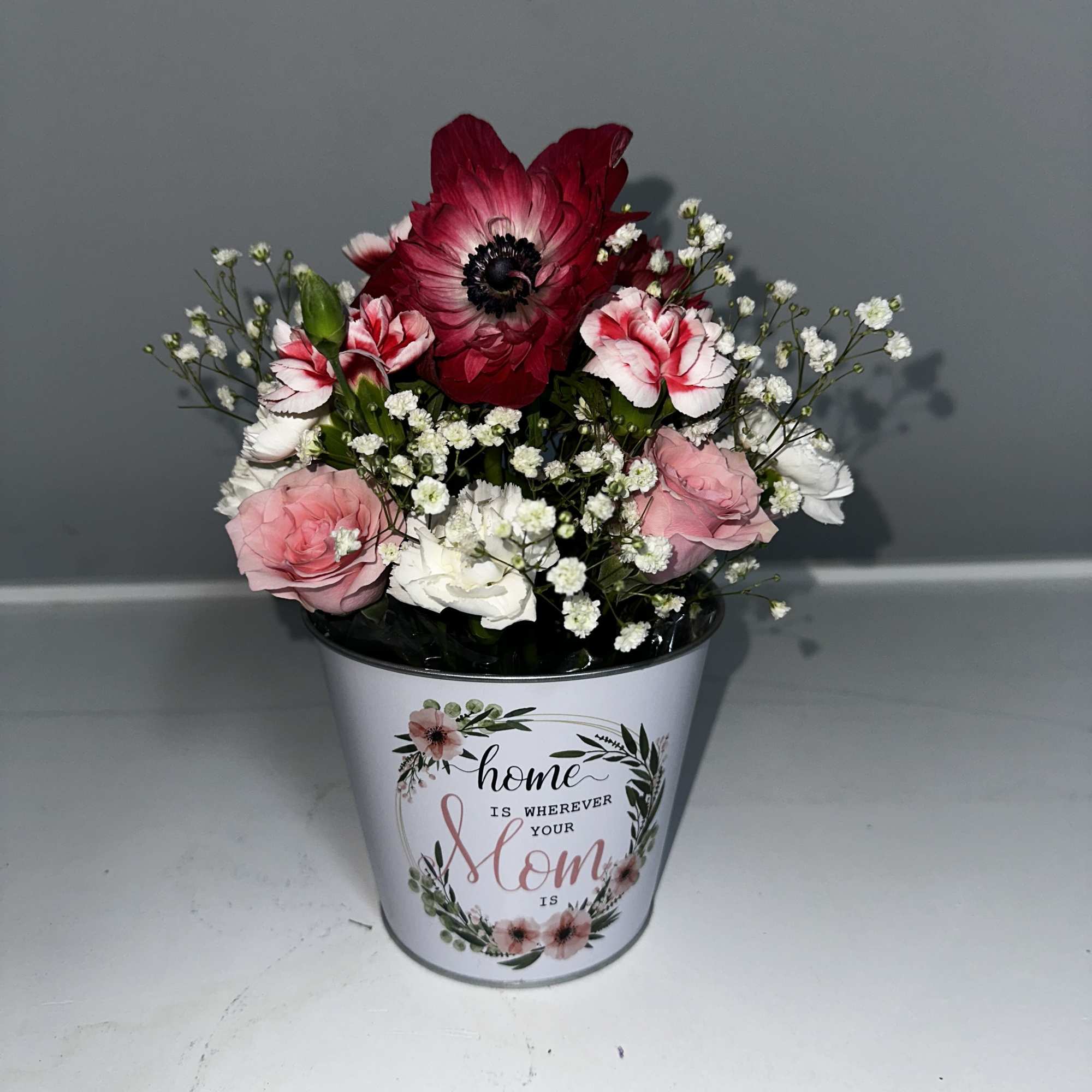 Surprise Mom this Mother&rsquo;s Day with a beautiful bucket of flowers! 