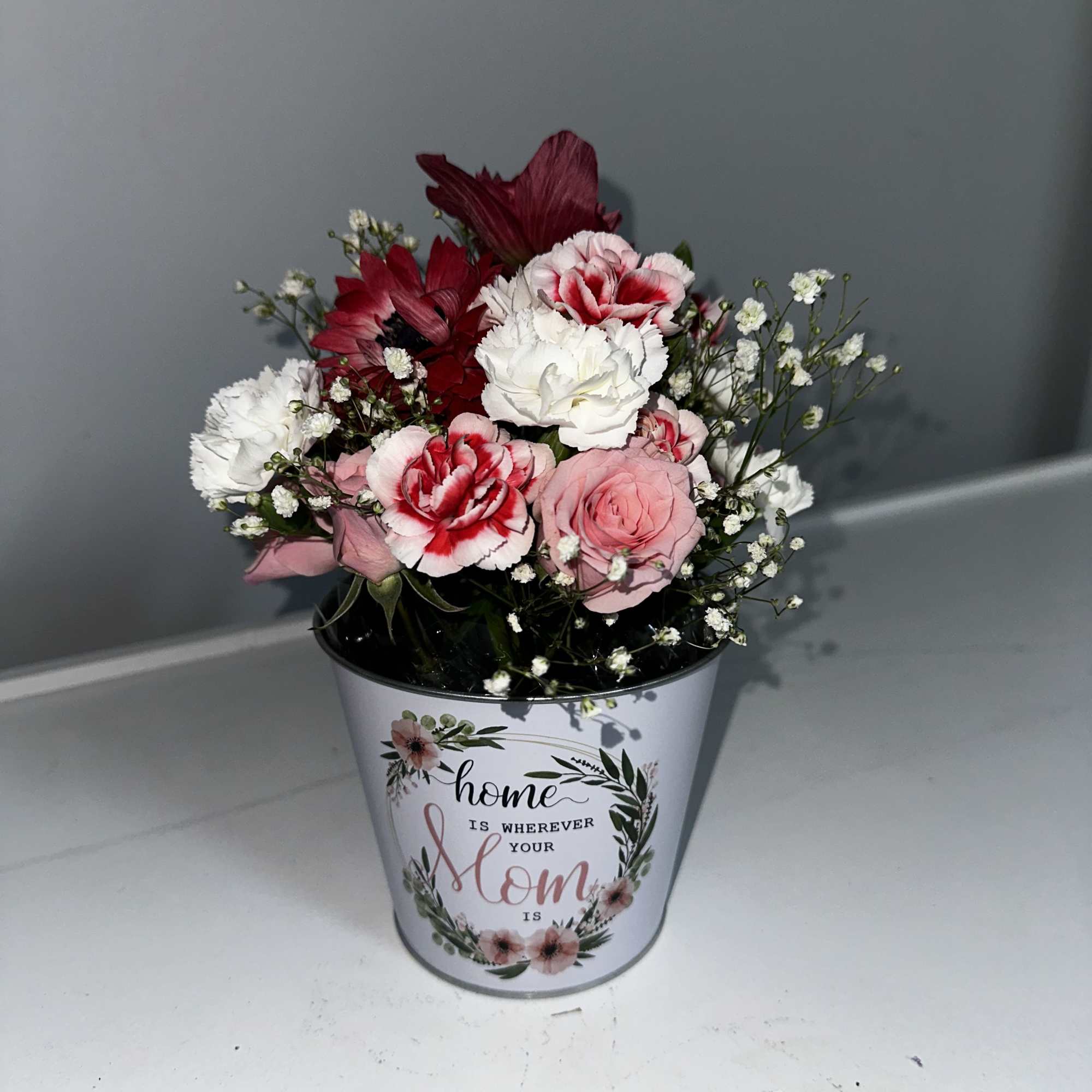 Surprise Mom this Mother&rsquo;s Day with a beautiful bucket of flowers! 