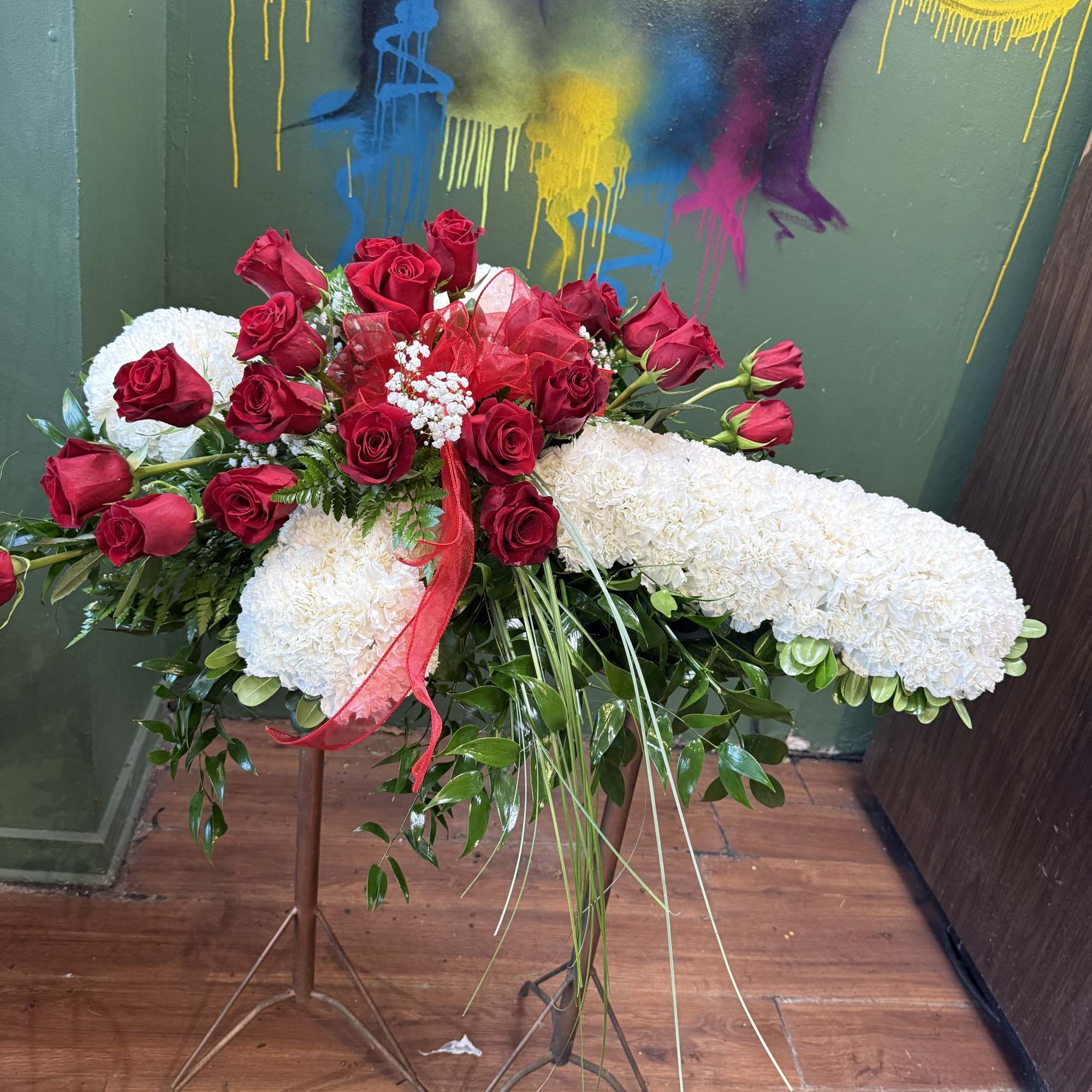 The Holy Cross Casket Spray is a gorgeous way to commemorate the