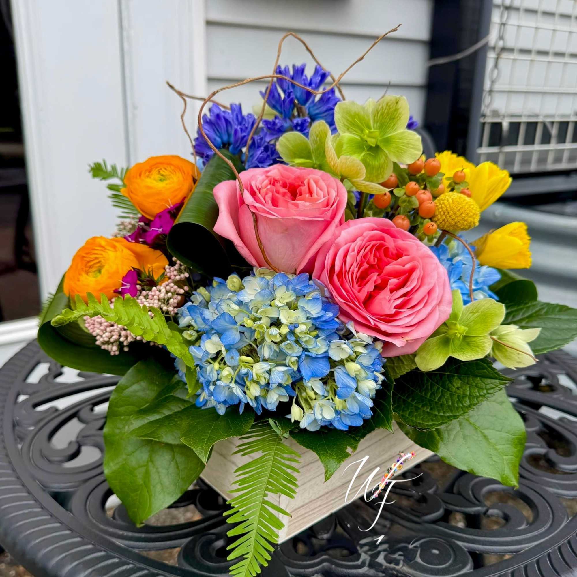 Bursts of vibrant colorful blooms are sure to pop for any occassion.