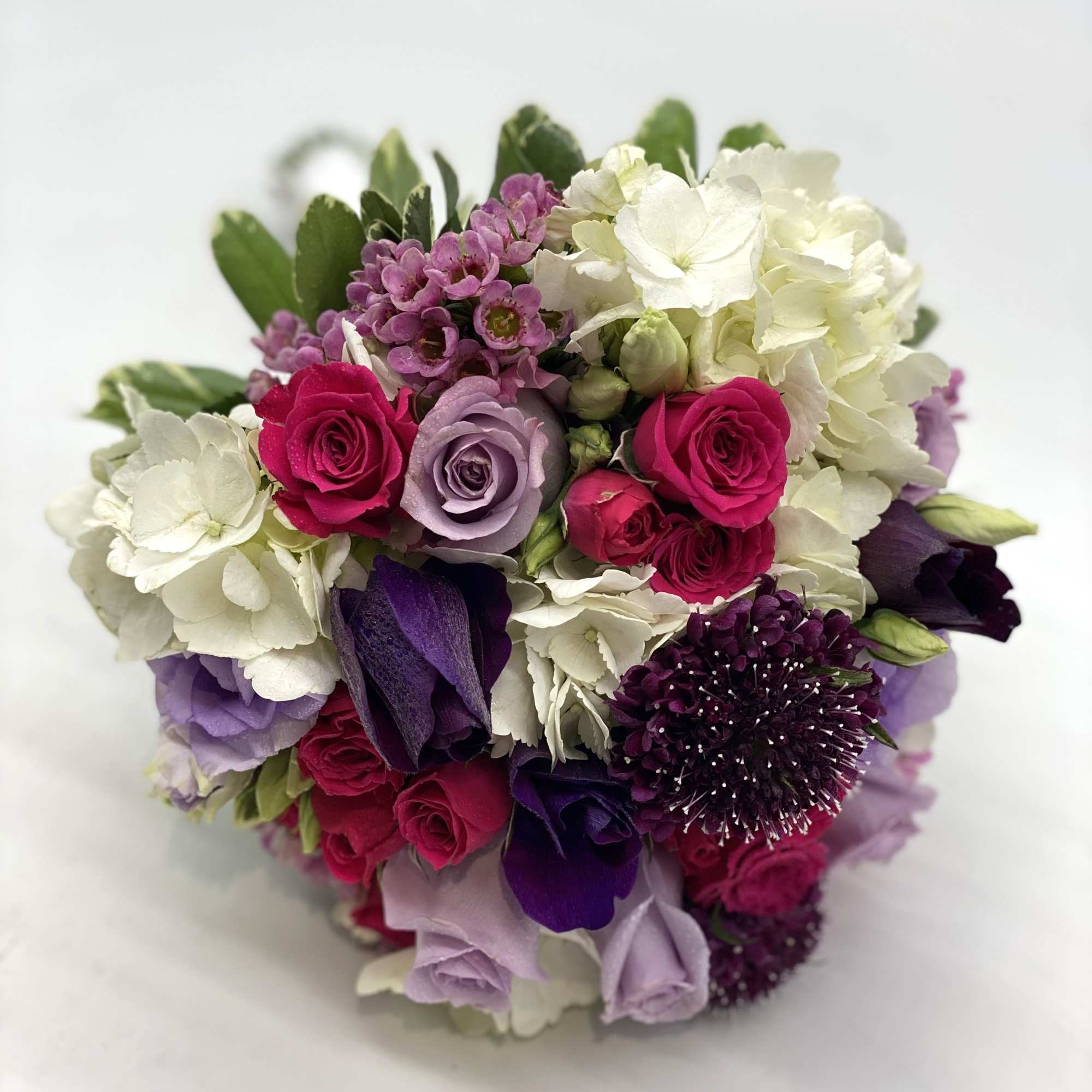 Whites, Deep Purple, Lavendar &amp; Hot Pink make this bouquet one of