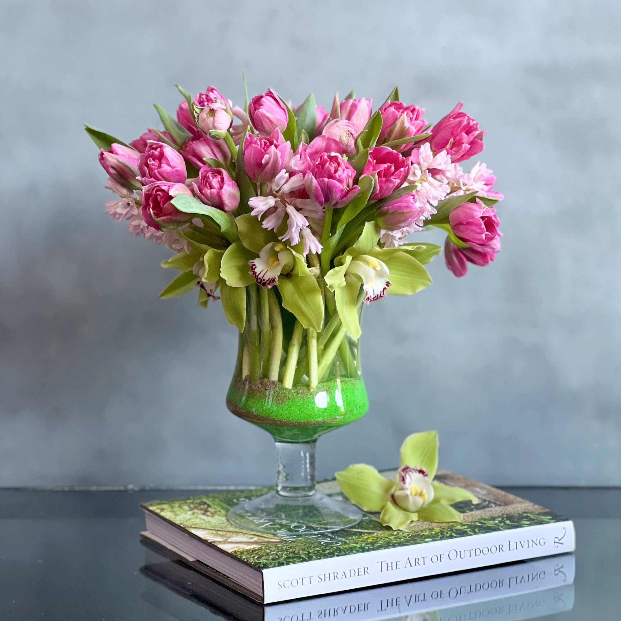 "Hello Spring" consists of a verity of pink spring flowers such as "Hello Spring" consists of a verity of pink spring flowers such as