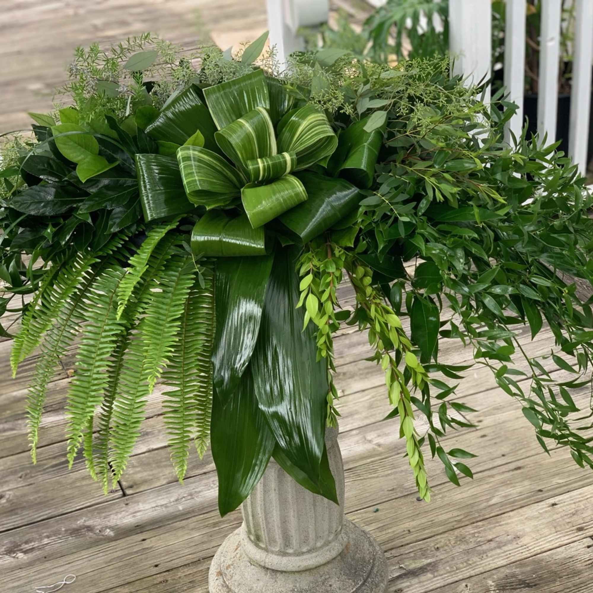 An All Foliage Casket Spray featuring a variety of different greeneries for An All Foliage Casket Spray featuring a variety of different greeneries for
