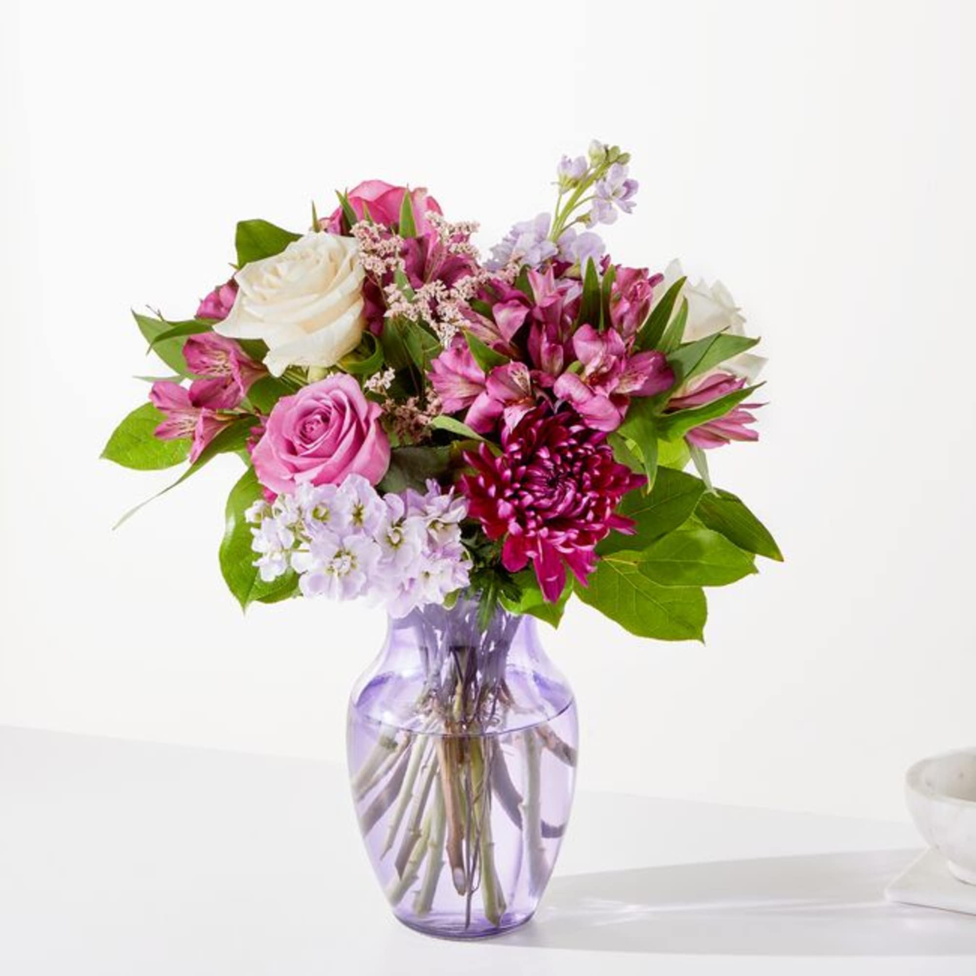 Calling all purple lovers! The Amethyst Dreams Bouquet features alstroemeria, stock, disbuds