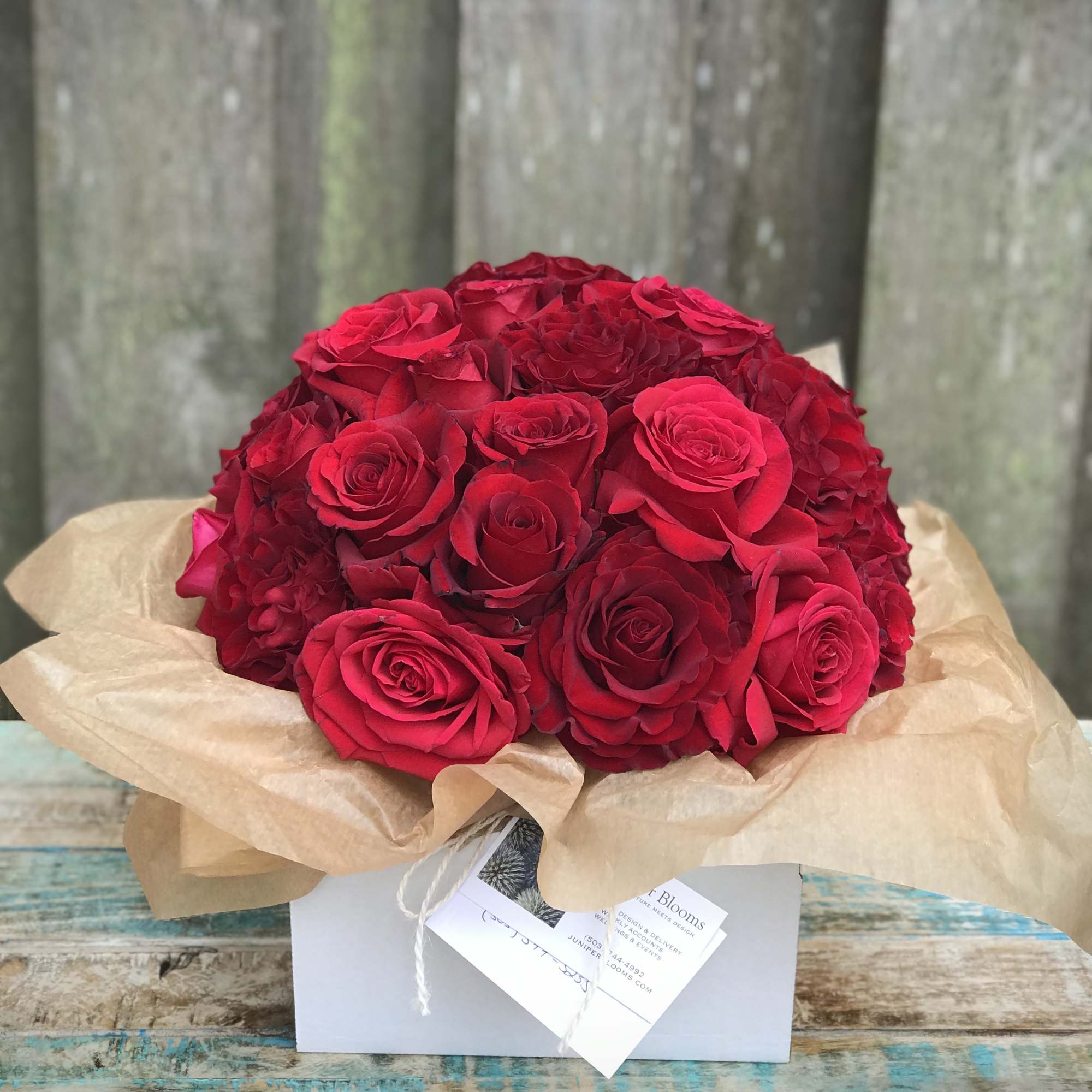2 dozen of our freshest red roses gathered close for a glamorous