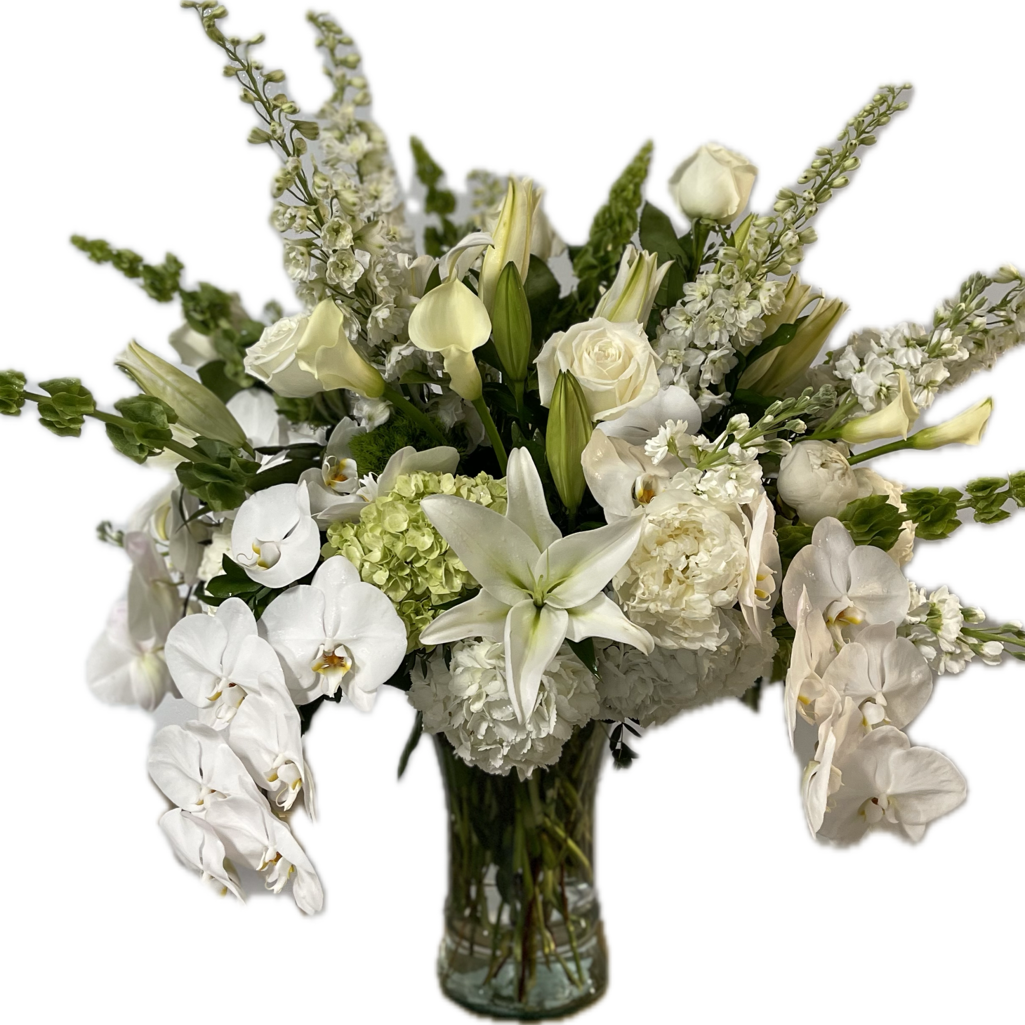 Stunning tall vase of an amazing variety of white flowers...Phalaenopsis orchids, roses Stunning tall vase of an amazing variety of white flowers...Phalaenopsis orchids, roses