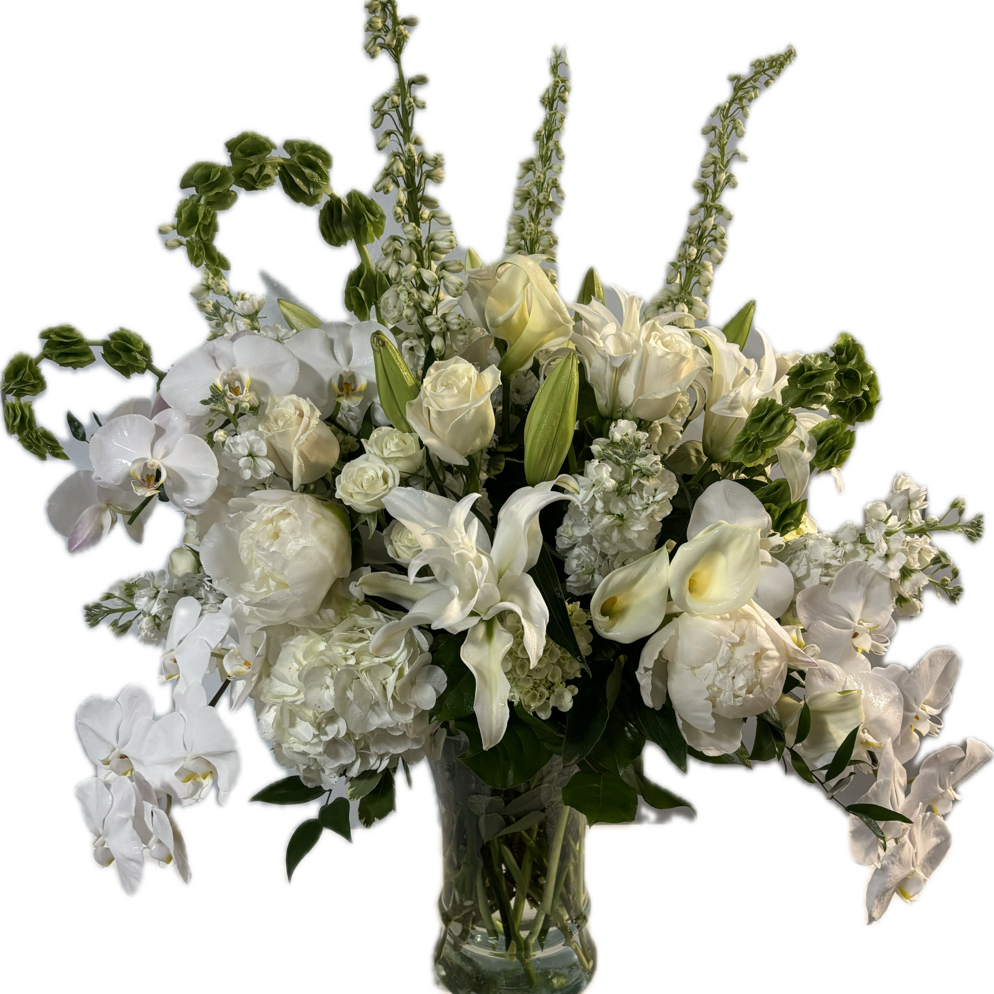 Stunning tall vase of an amazing variety of white flowers...Phalaenopsis orchids, roses Stunning tall vase of an amazing variety of white flowers...Phalaenopsis orchids, roses