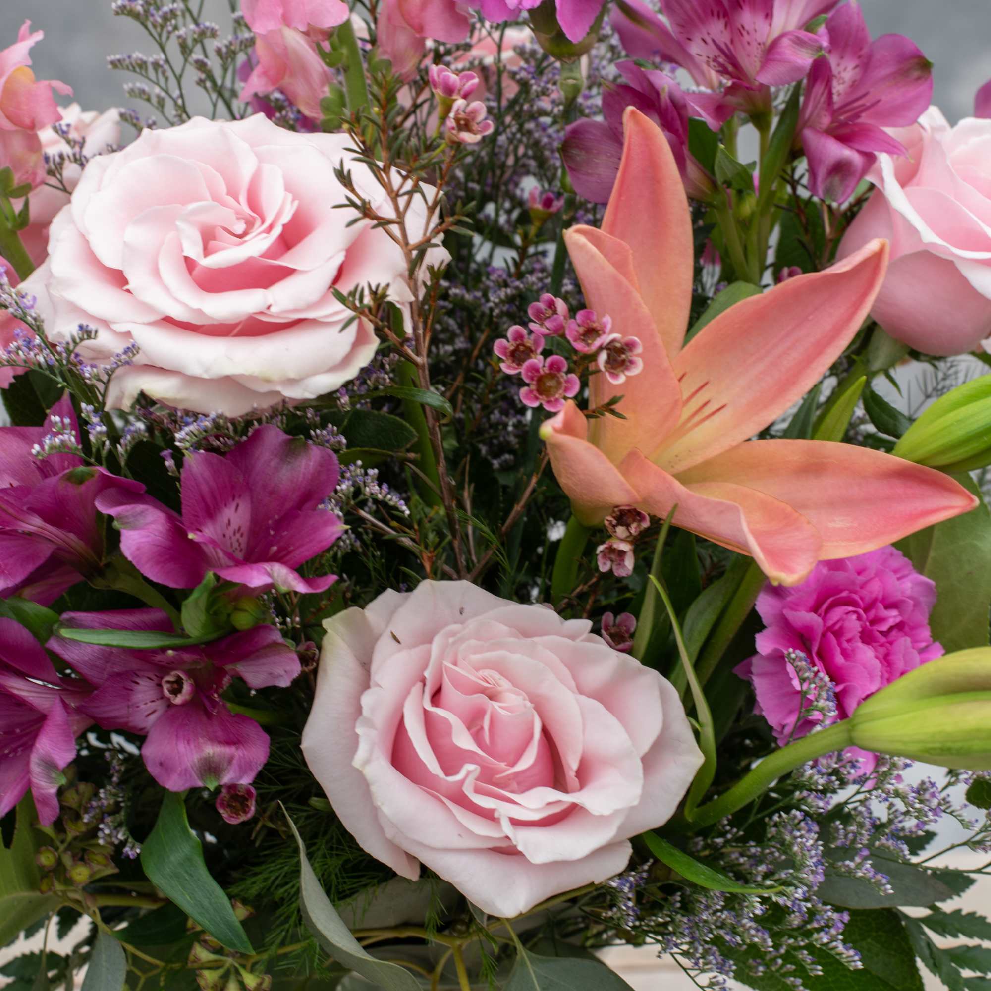 Surely to Delight any Mother, this beautiful 10.5&quot; classic clear vase overflowing