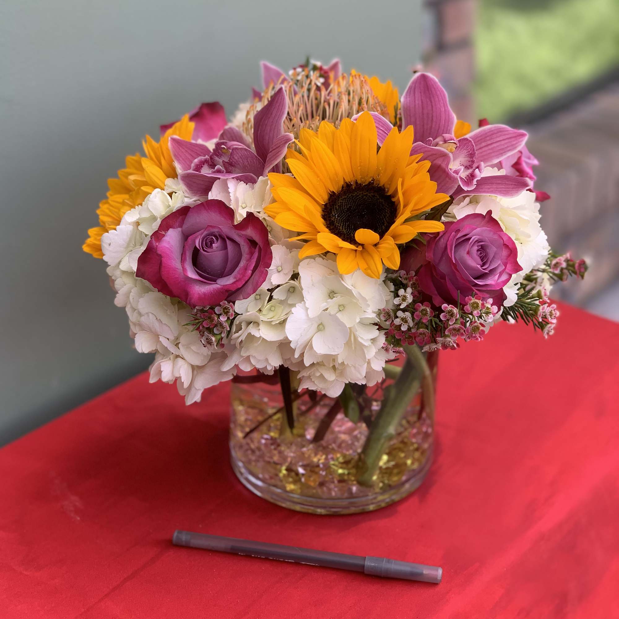 A cheerful assortment of flowers designed to perfection as a happy family