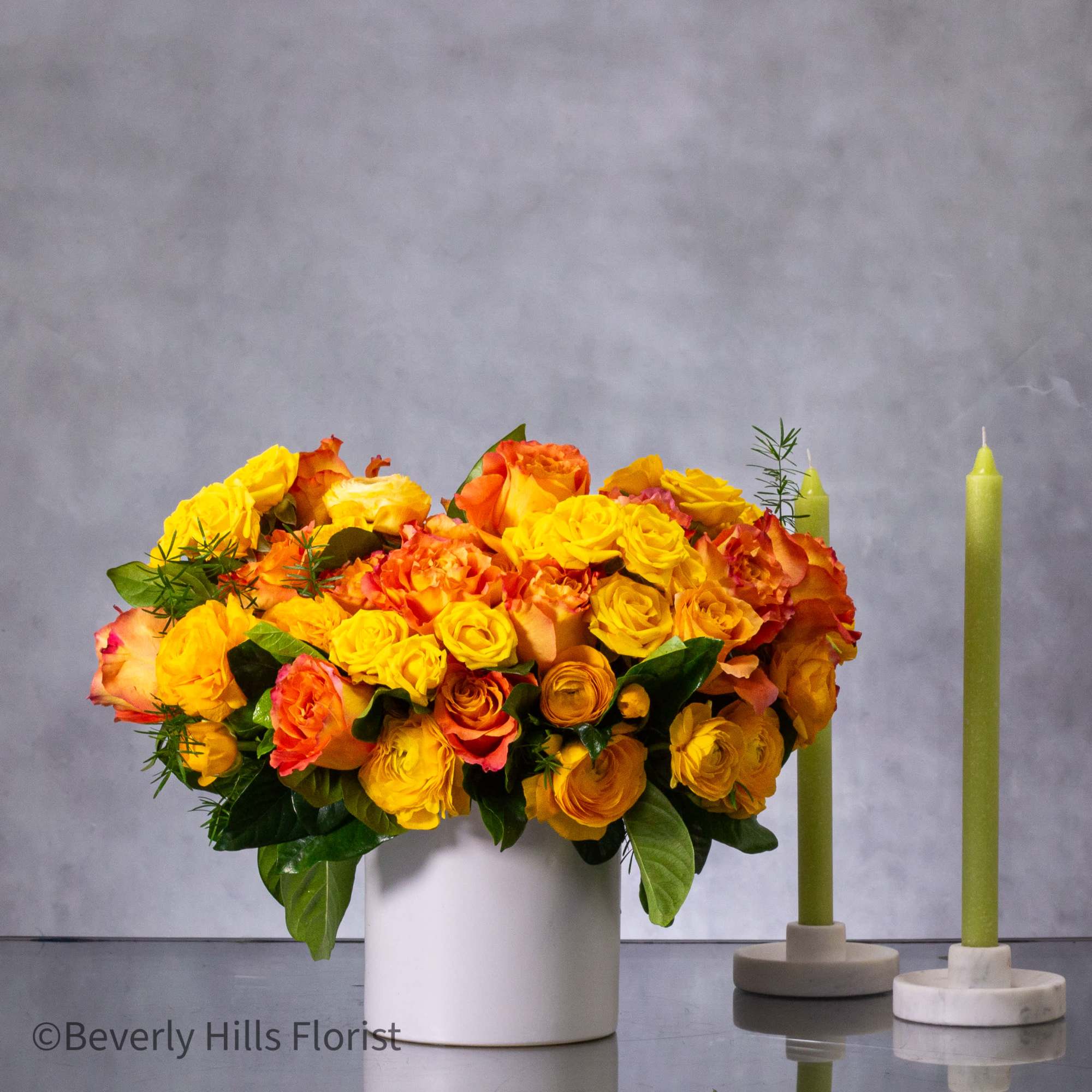 Indulge in the radiant beauty of our "Citrus Sunset Elegance" floral arrangement Indulge in the radiant beauty of our "Citrus Sunset Elegance" floral arrangement