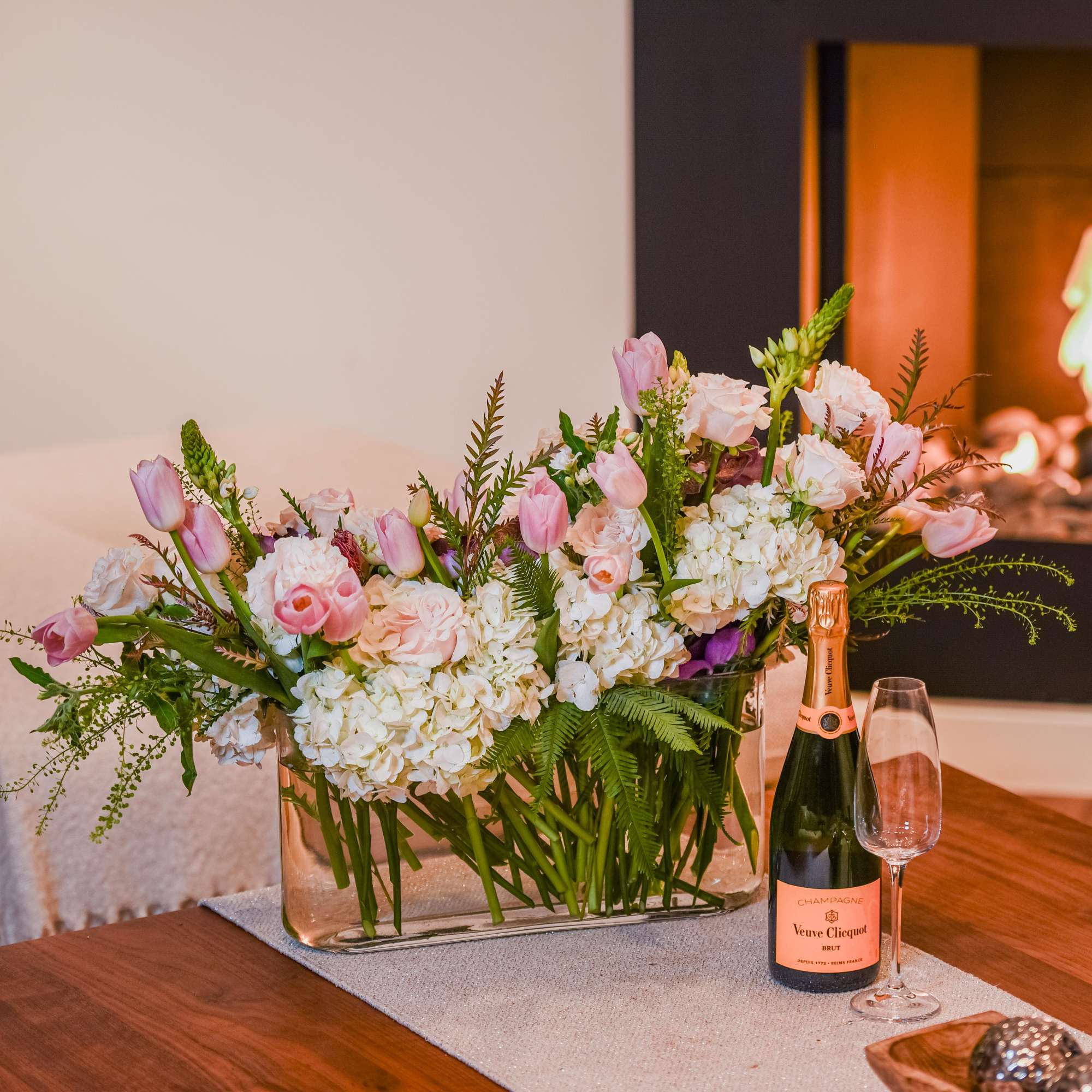 Delight in the enchanting beauty of our Floral Harmony arrangement, gracefully showcased Delight in the enchanting beauty of our Floral Harmony arrangement, gracefully showcased