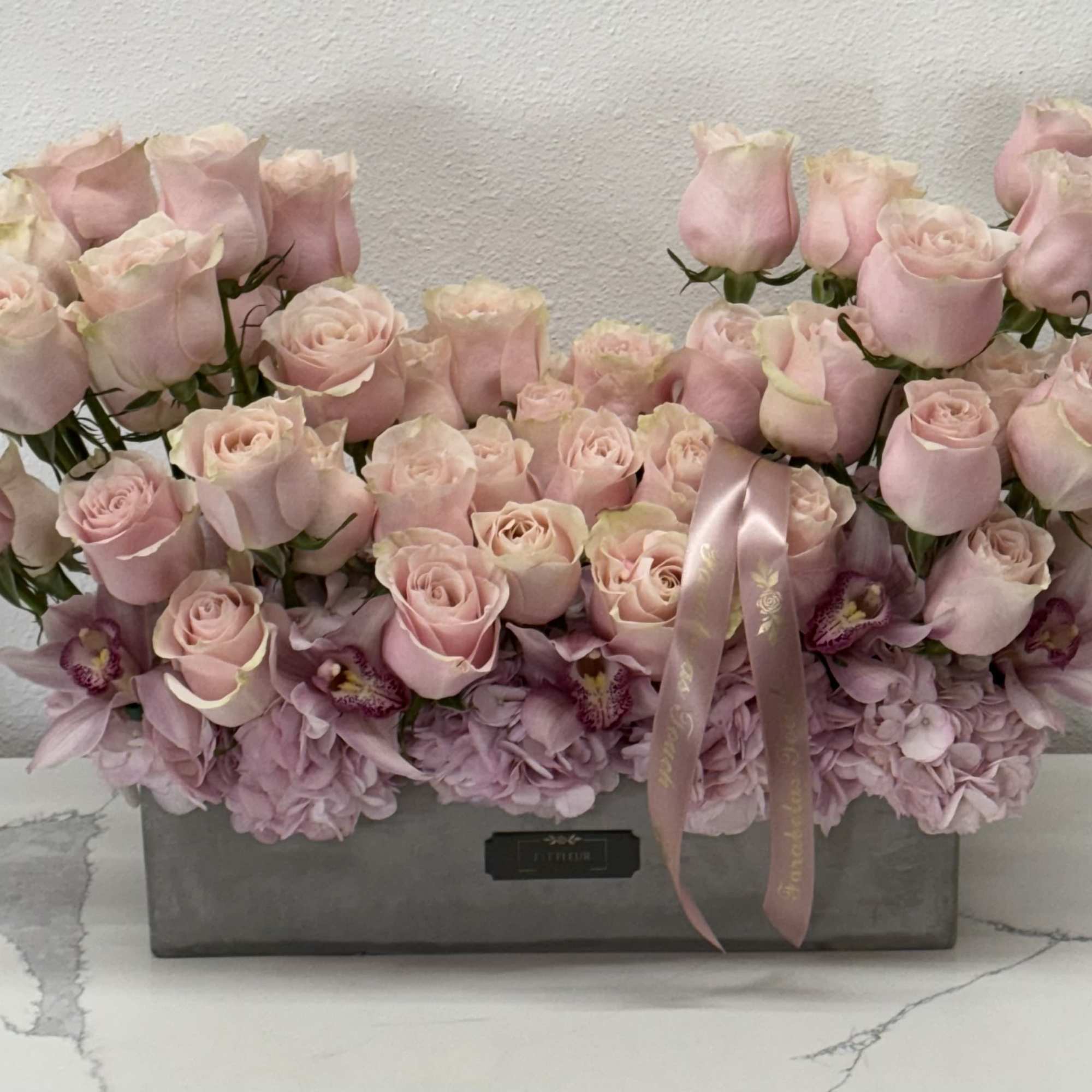 **Elegant Pink Roses Arrangement: Elevate Your Special Occasion**

Celebrate your special occasion with