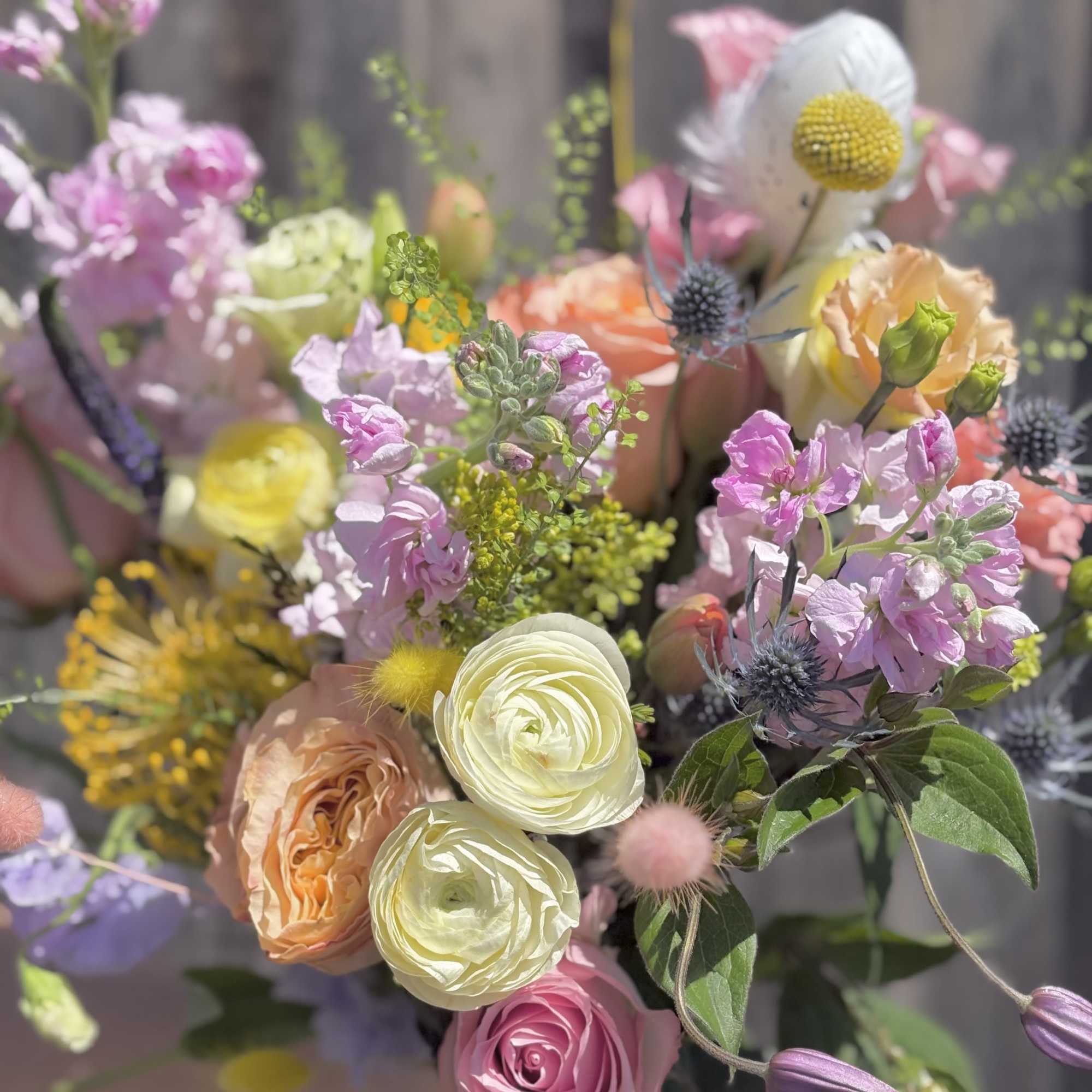 A joyful mix of pastel blooms in a fun, spring-inspired bouquet. 