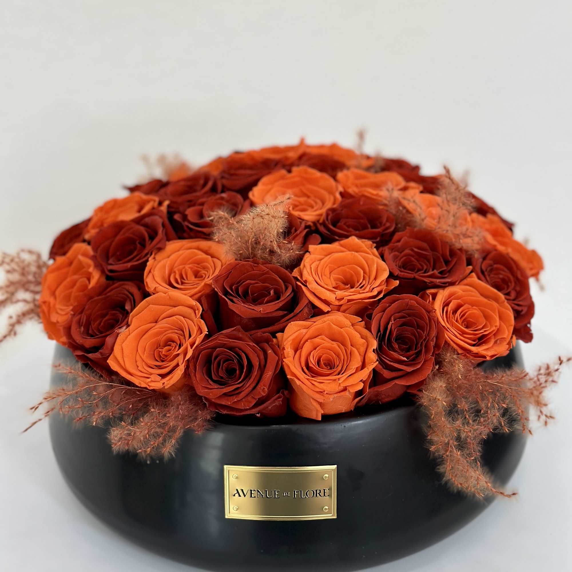 These stunning orange forever roses bring a pop of sunshine to any