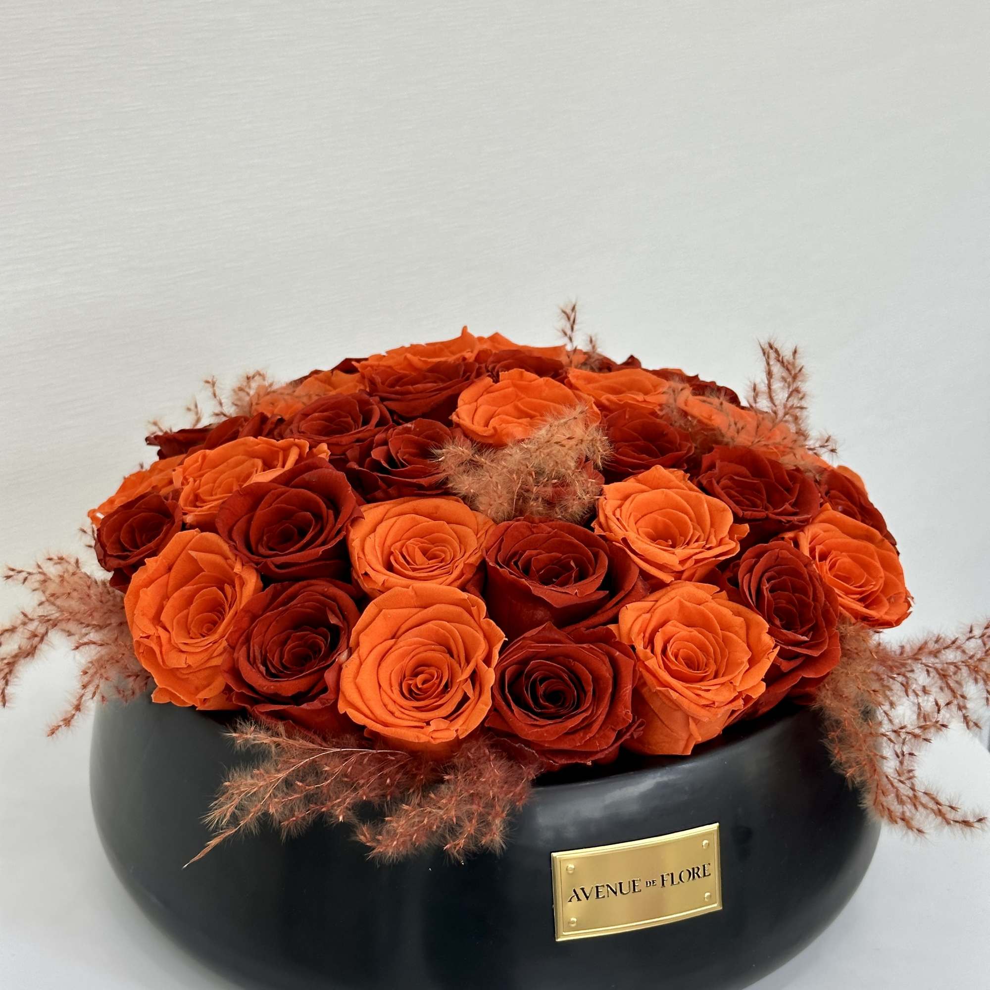 These stunning orange forever roses bring a pop of sunshine to any