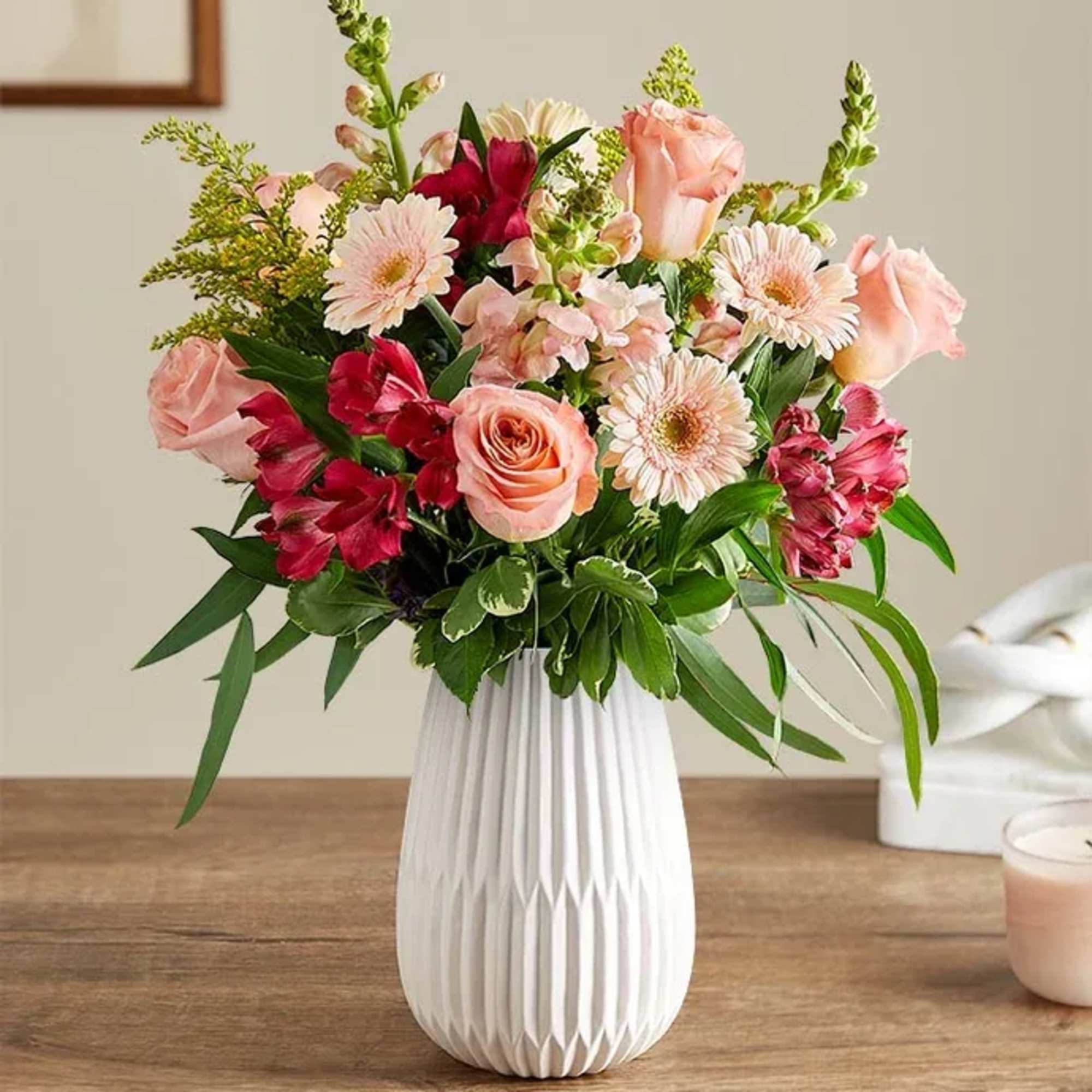 This blush-colored gathering features hints of peach and pink, along with accents This blush-colored gathering features hints of peach and pink, along with accents