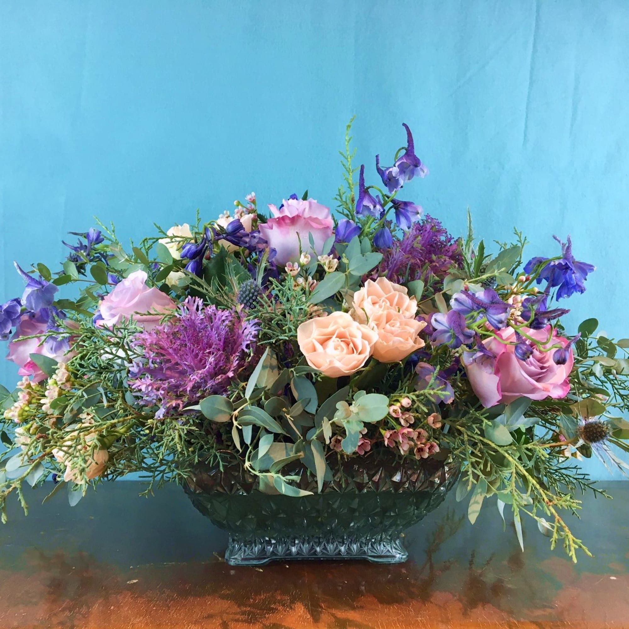 These floral arrangements are designed to be table centerpiece - where guests