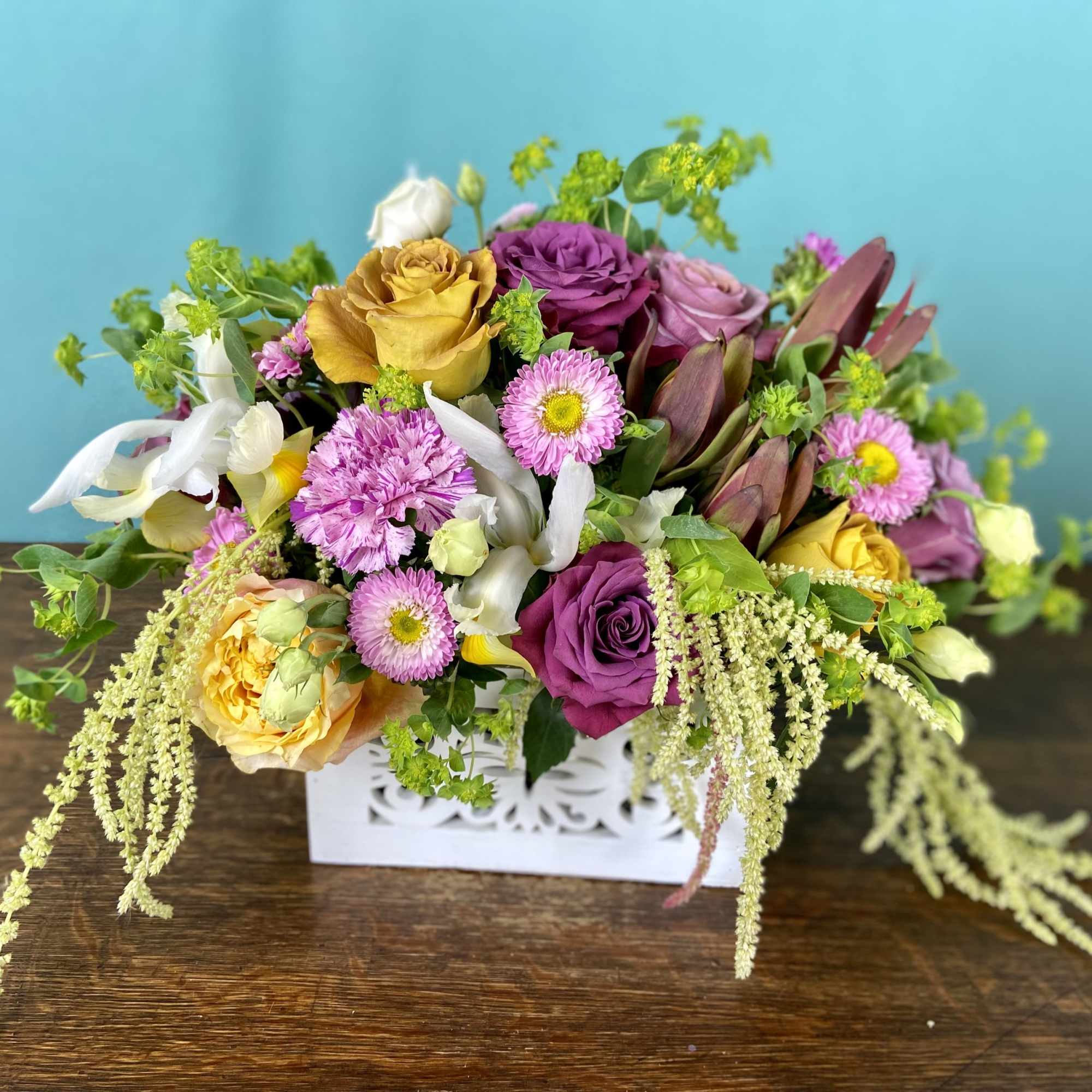 These floral arrangements are designed to be table centerpiece - where guests
