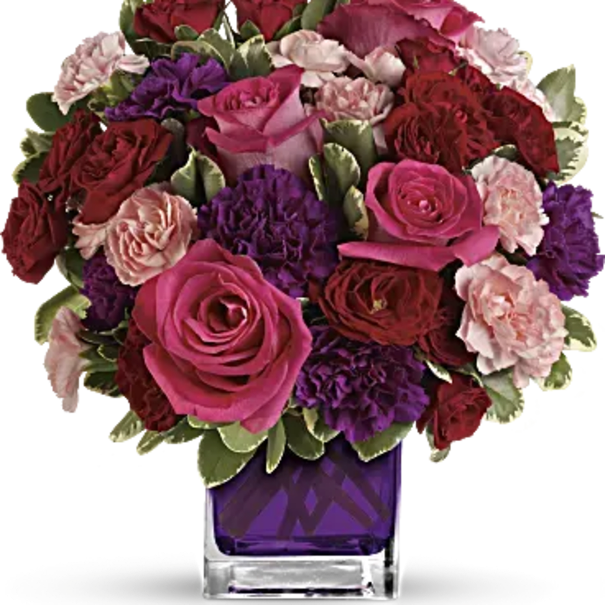 Pure romance. Hot pink roses and dark red spray roses are brightly