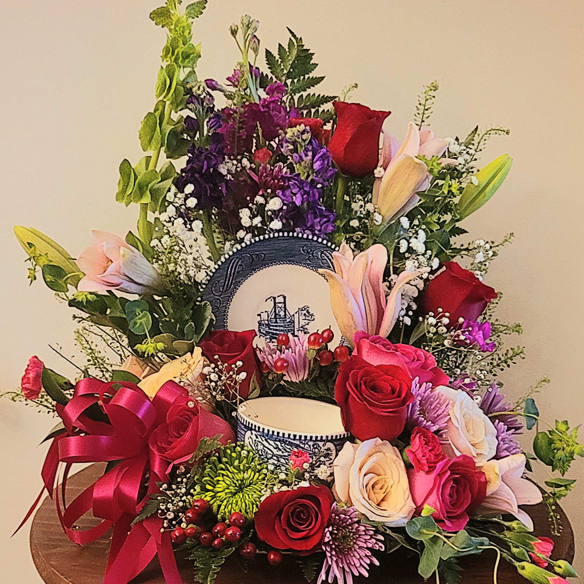 This arrangement is a bright and colorful design with a collection of