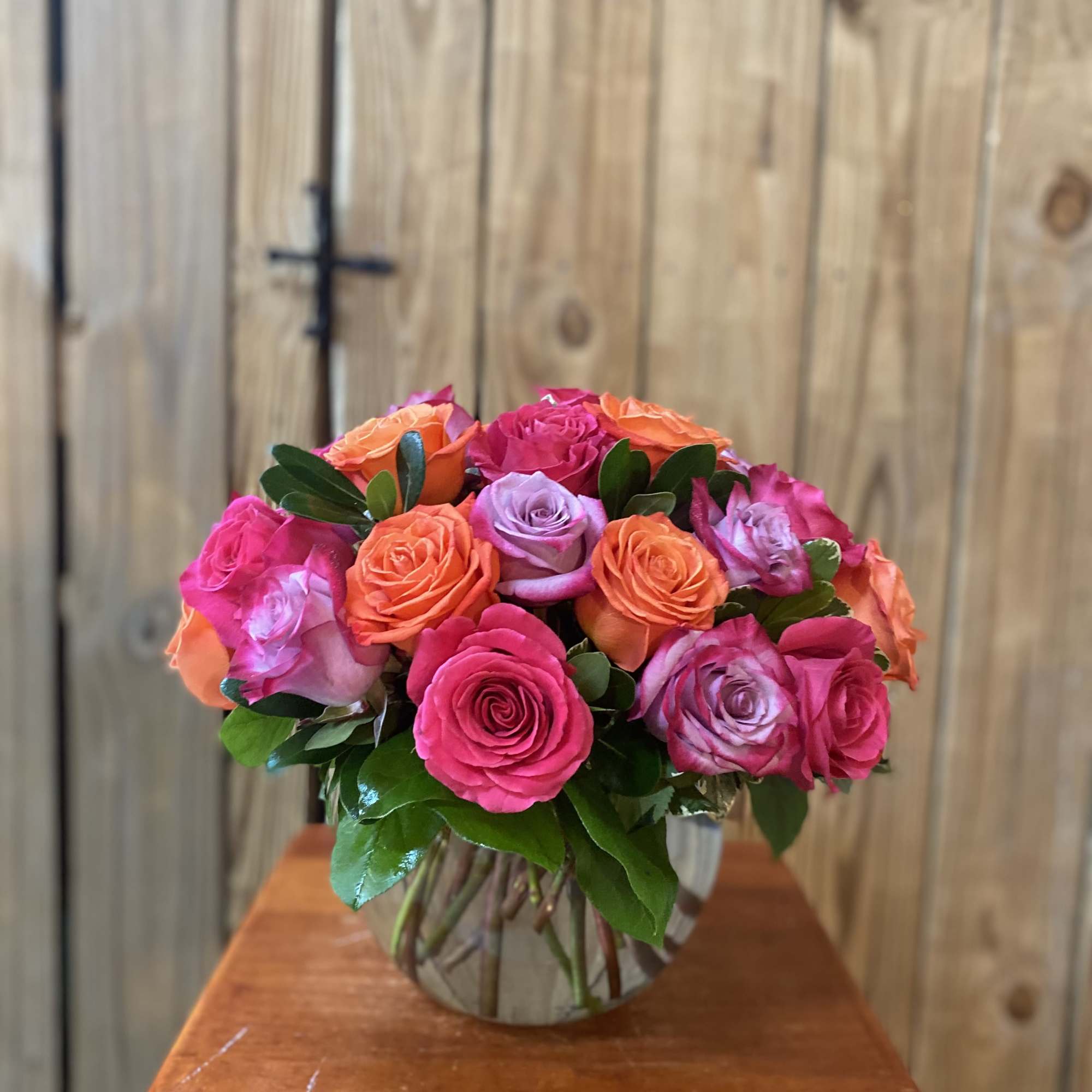 A lovely bowl of colorful roses brightens and lifts any room (and