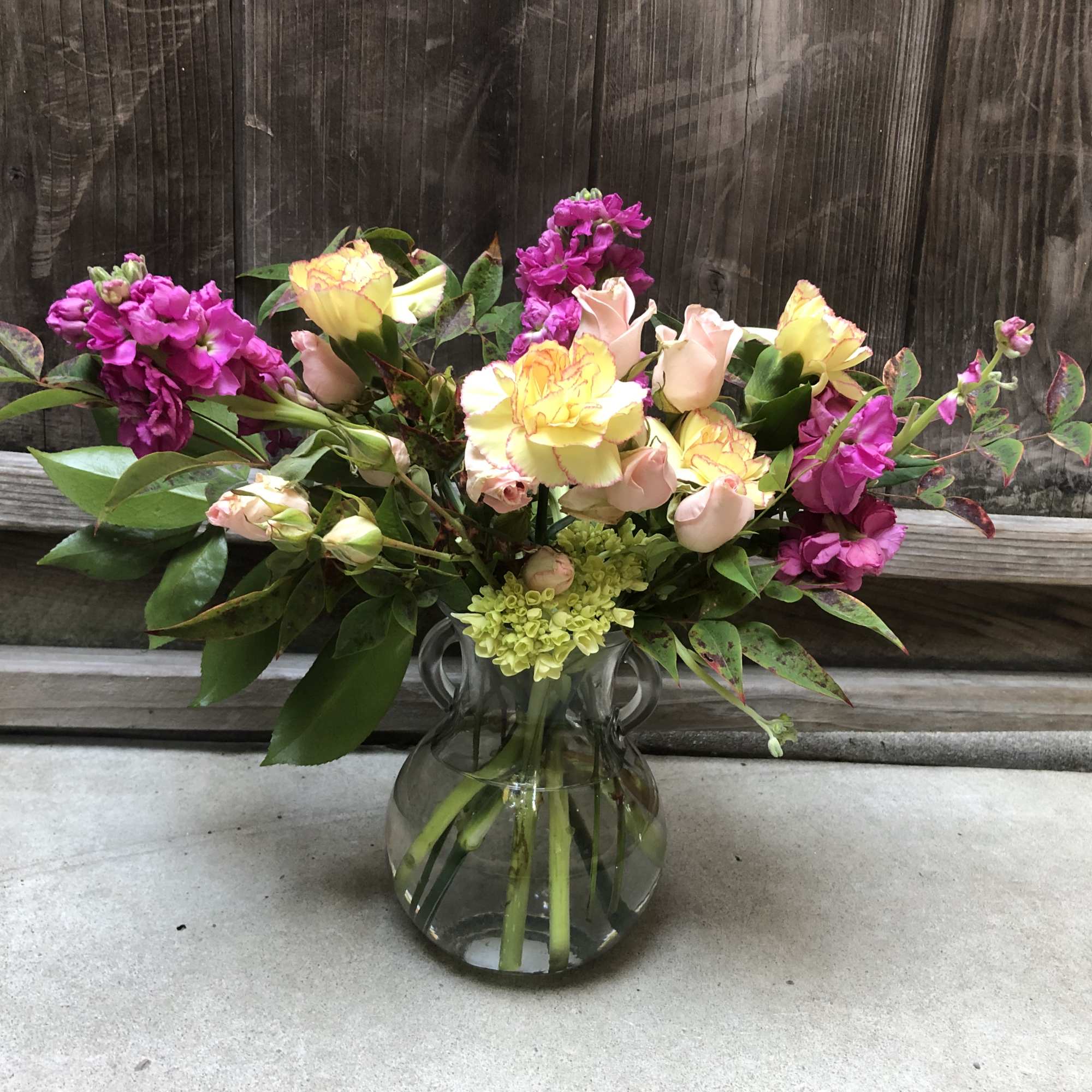 Bright and bold beachy colored arrangement that you need to wear sunglasses