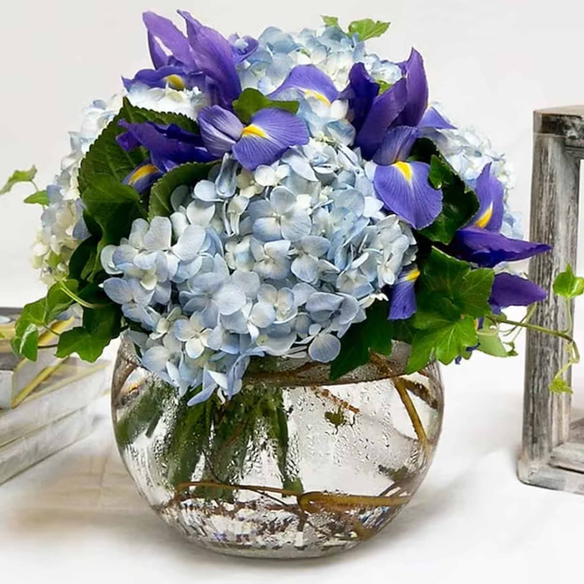 Need an arrangement that reminds you of the perfect sky blue day?